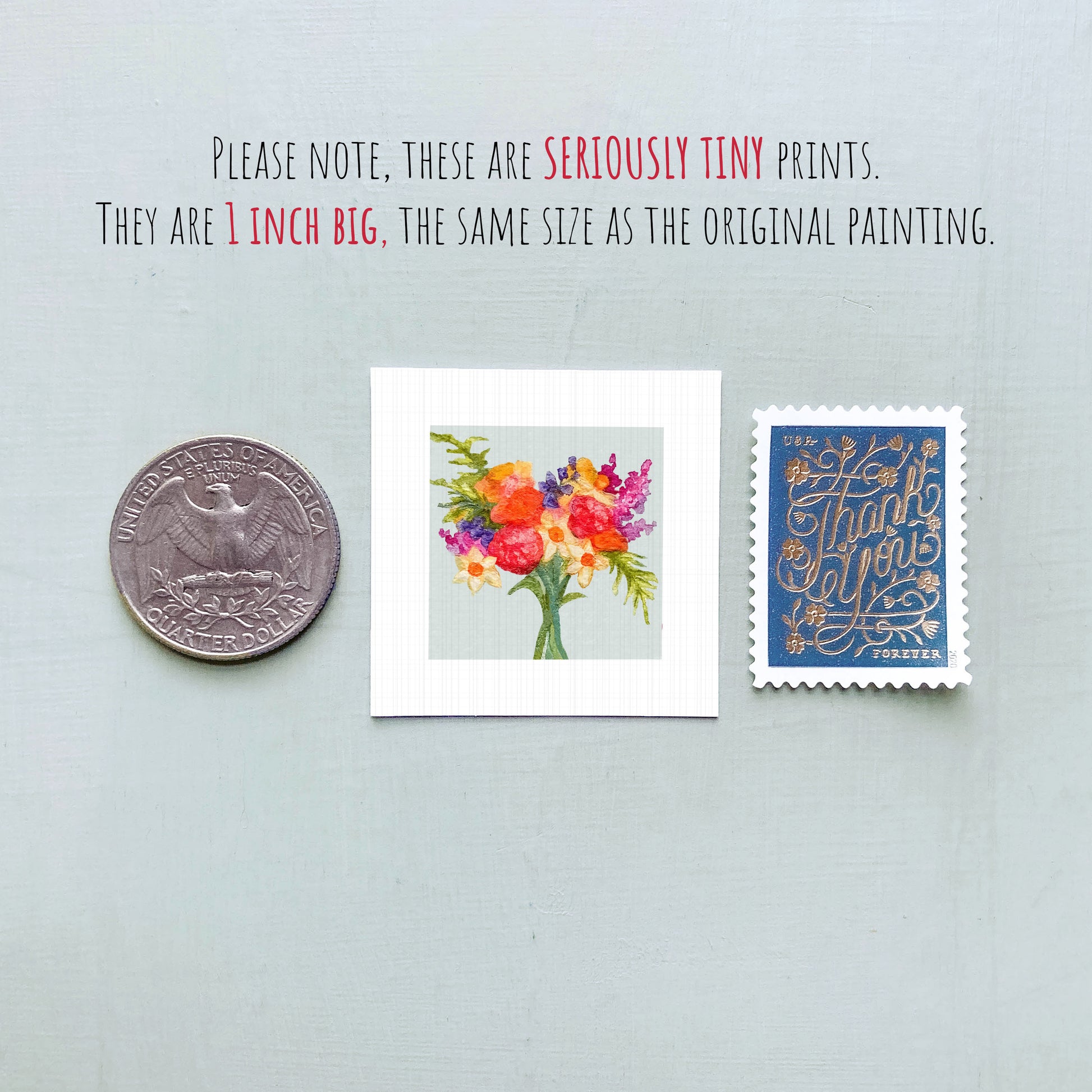 three small prints: a silver coin, a framed print of a colorful floral arrangement, and a blue postage stamp with gold lettering.