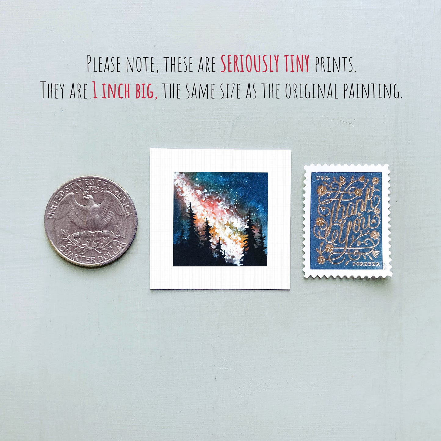 three small prints: a quarter, a square print of a night sky with trees, and a postage stamp.