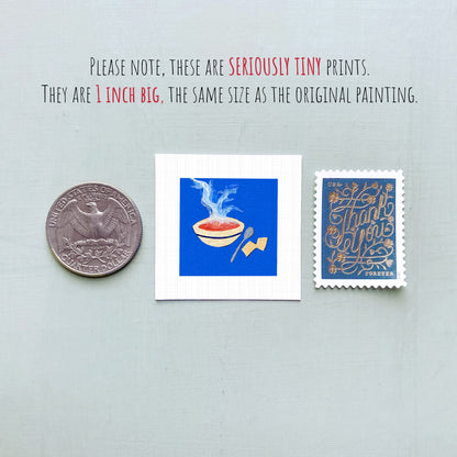 three small artworks: a quarter, a square with a blue background and an illustration of a bowl of soup, and a postage stamp.