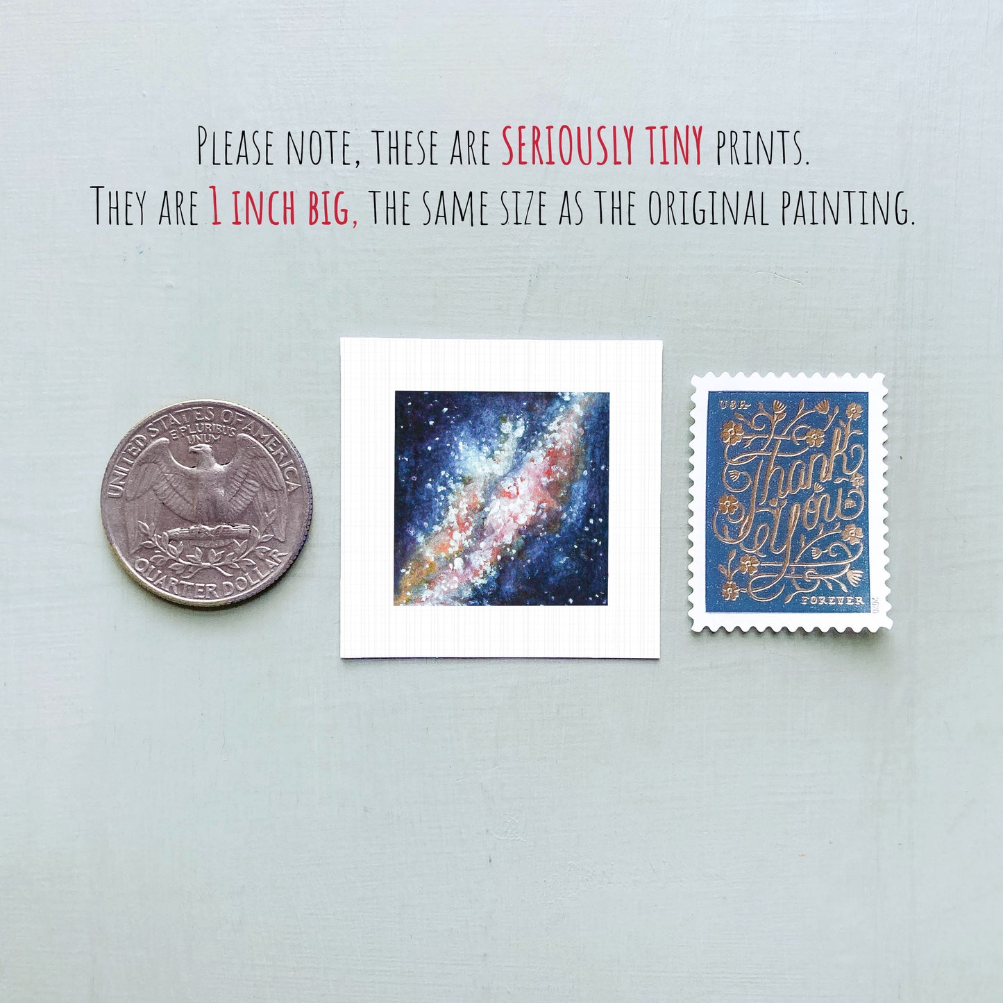three small prints: a quarter, a painting of a galaxy, and a postage stamp.