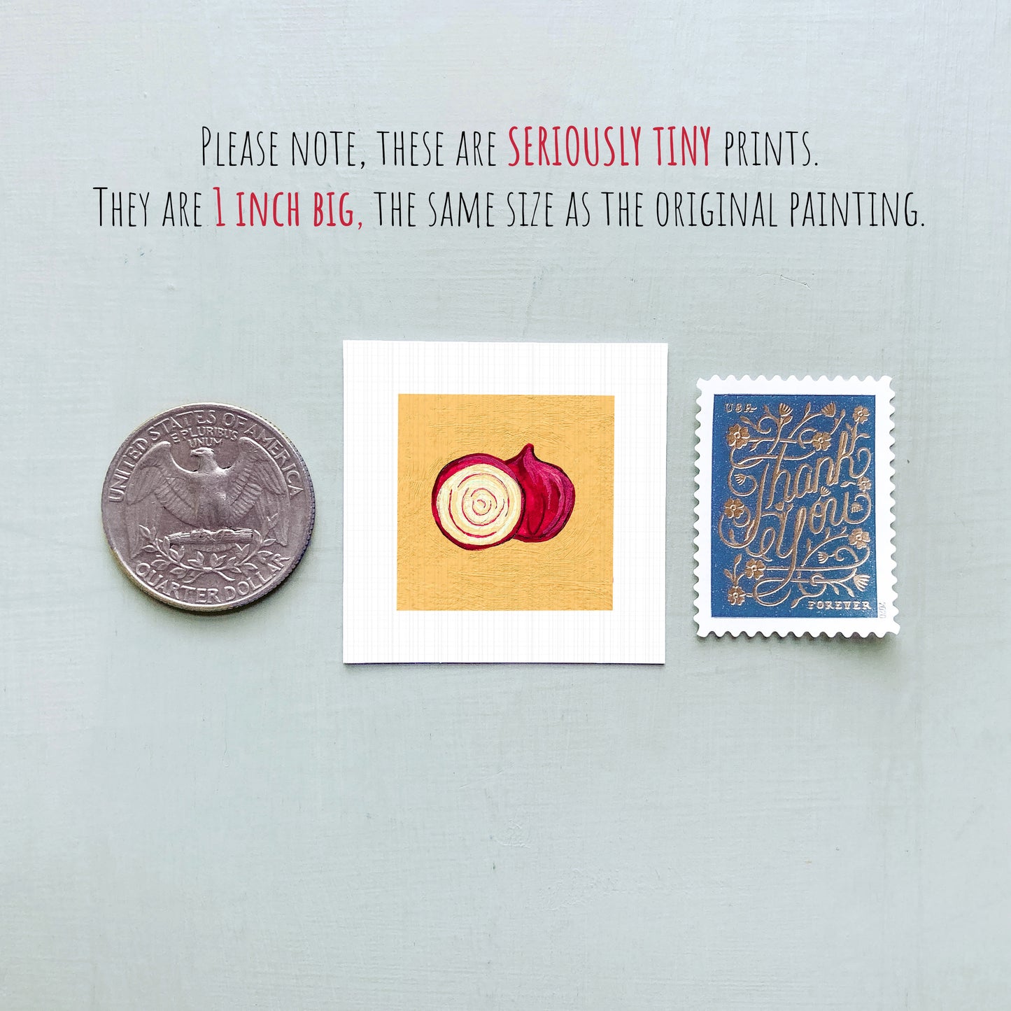 three small prints: a silver coin, a square print with an illustration of an onion, and a blue postage stamp.