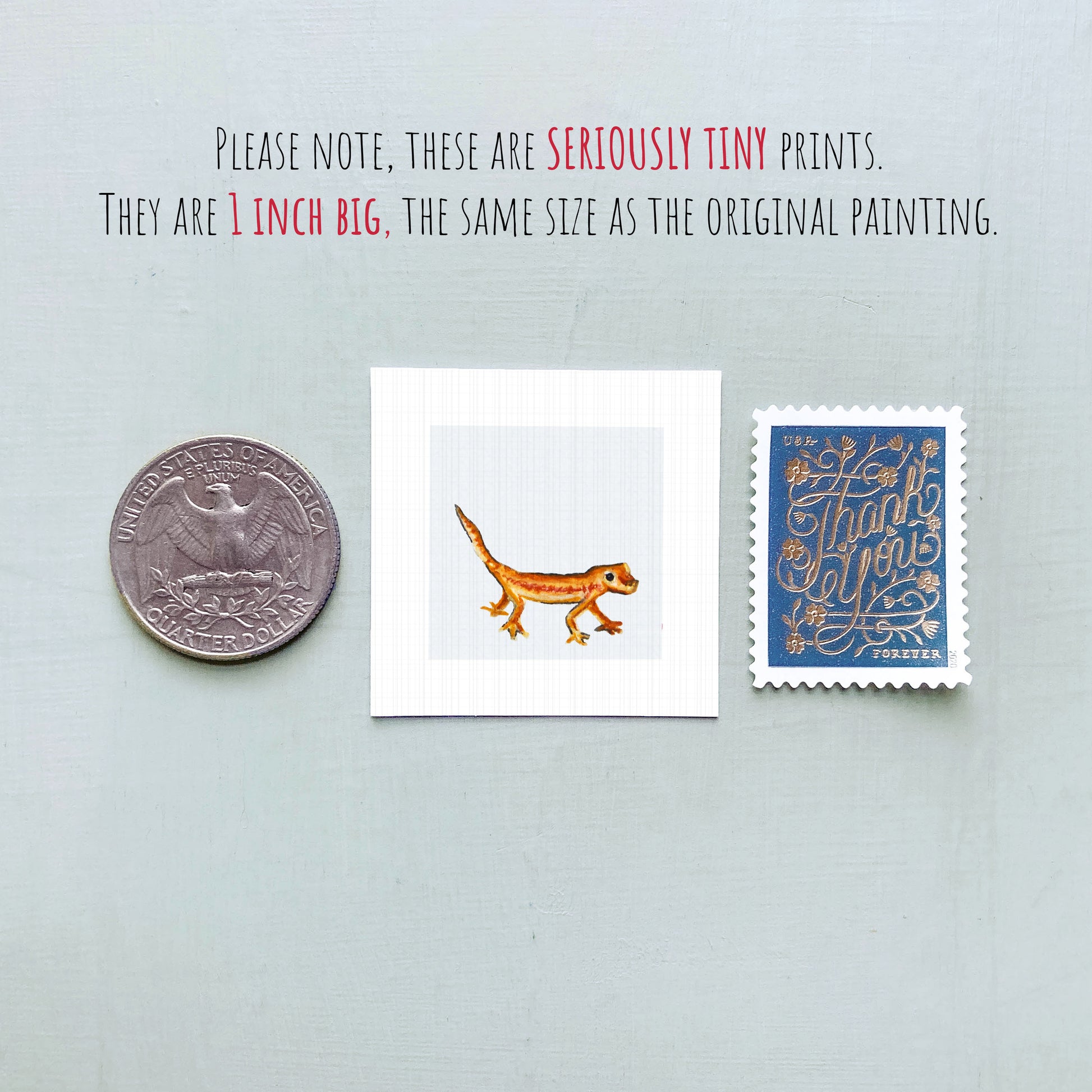 three small, seriously tiny prints: a quarter, a square print of a lizard, and a postage stamp.