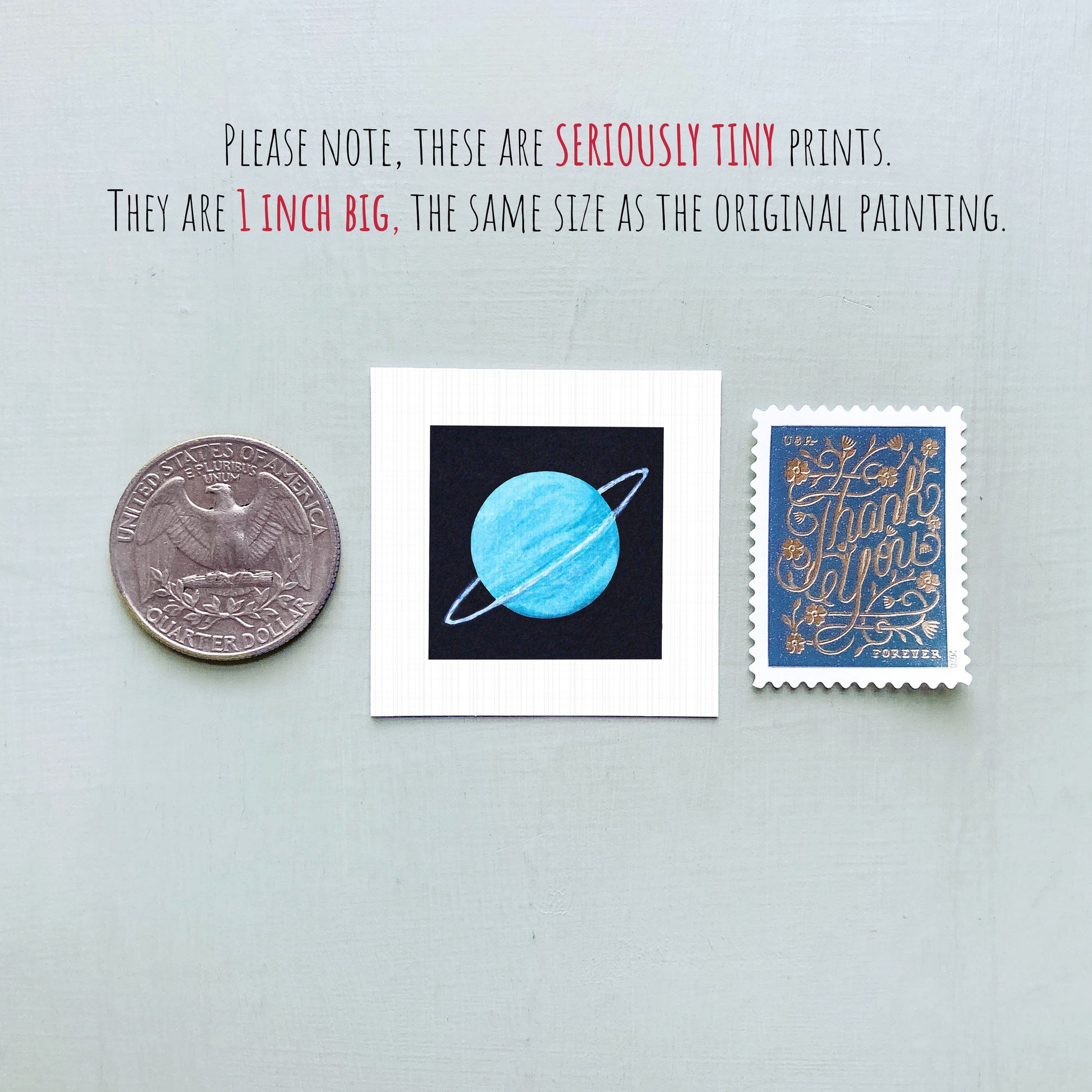 three small items: a quarter, a square with a blue planet illustration, and a postage stamp.