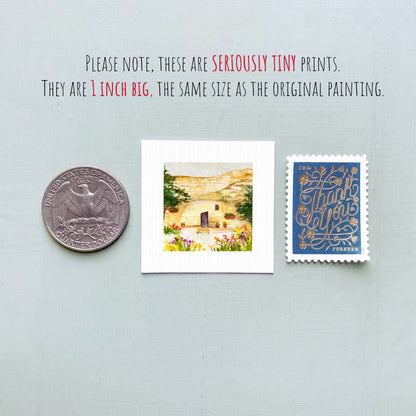 a collection of three small items: a quarter, a postcard, and a stamp.