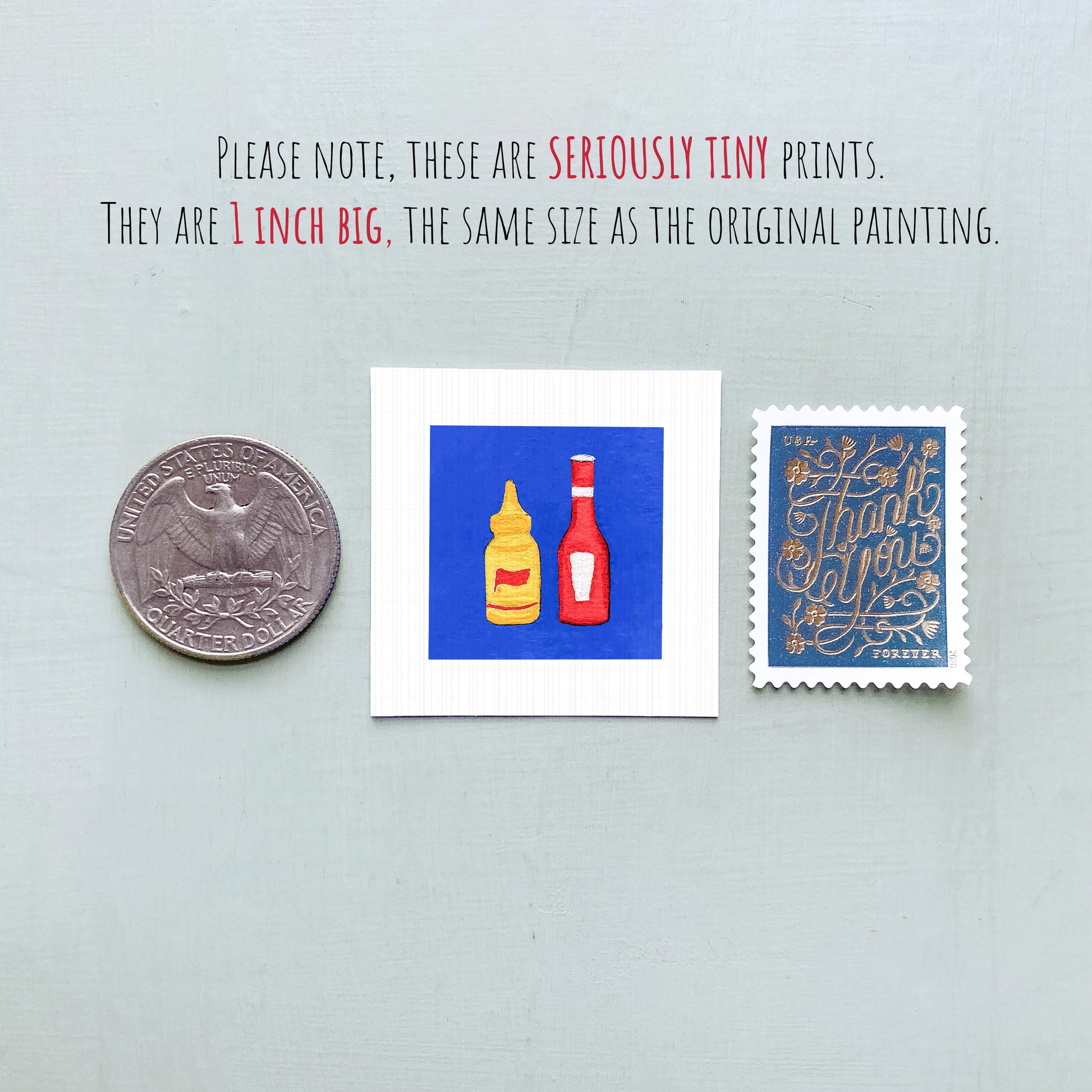 three small, seemingly miniature prints: a United States quarter, a small square with a blue background and two bottles of ketchup, and a small blue postage stamp.