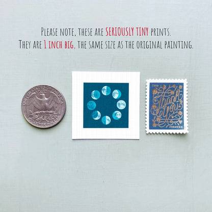 three small prints: a quarter, a square print with a moon phase design, and a postage stamp.
