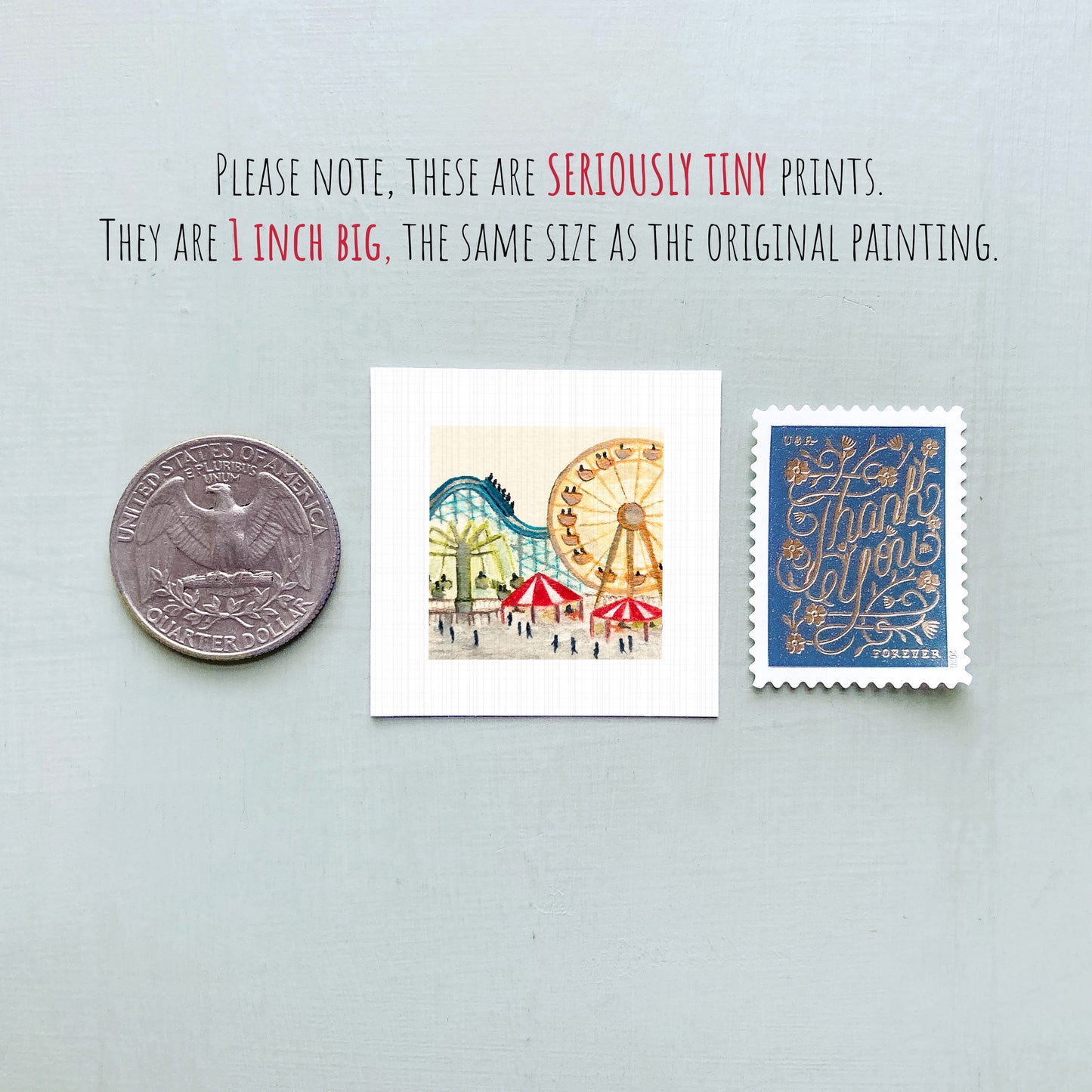 three small prints and a coin, all of which are described as "seriously tiny prints" and "1 inch big," respectively.