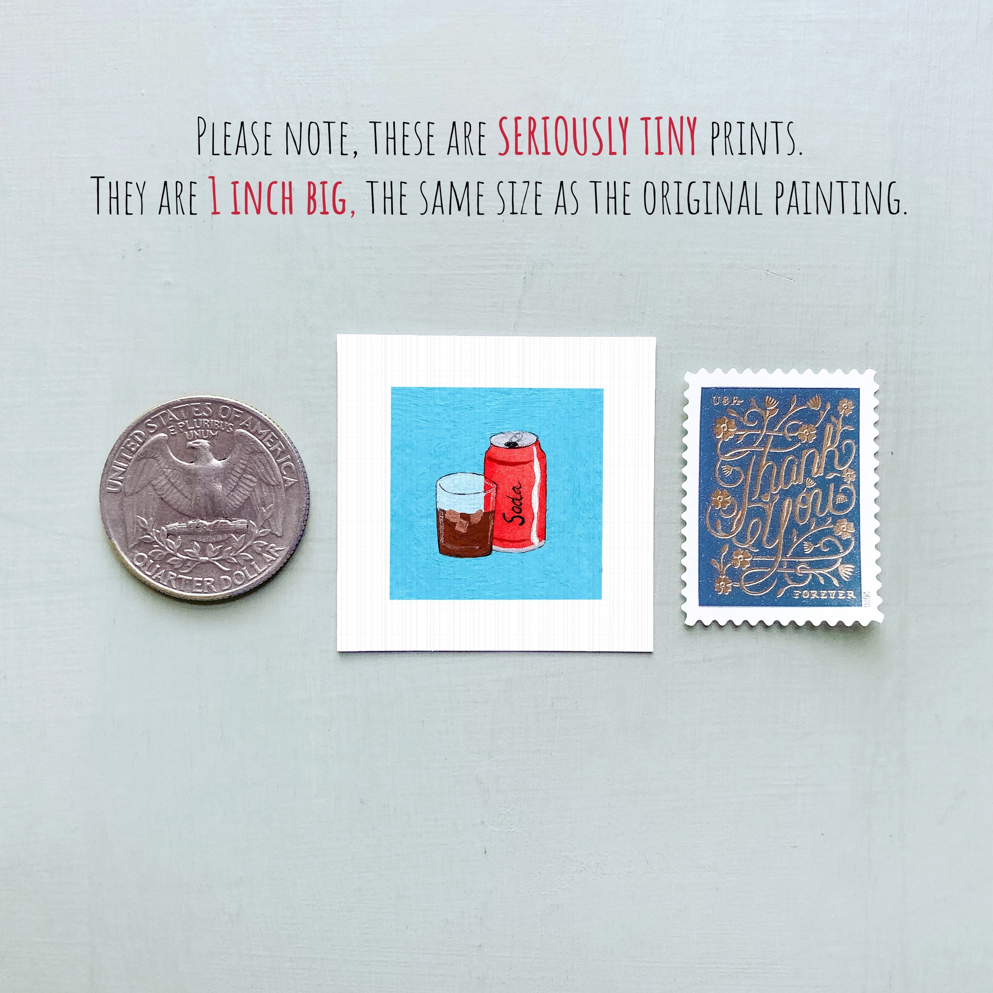three small, seriously tiny prints: a quarter, a blue square with a red can and glass illustration, and a blue postage stamp with gold lettering.
