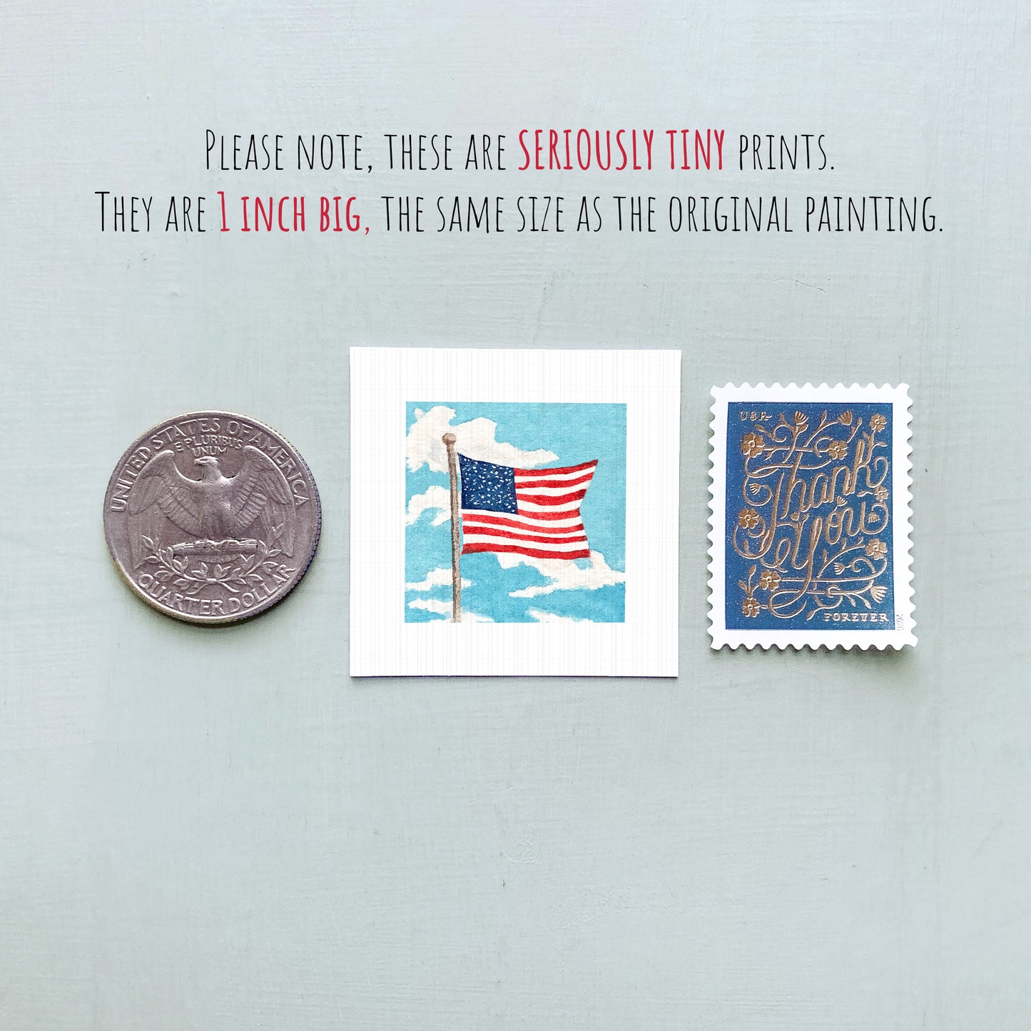 three small American flag-themed items: a quarter, a postage stamp, and a miniature painting of the American flag.