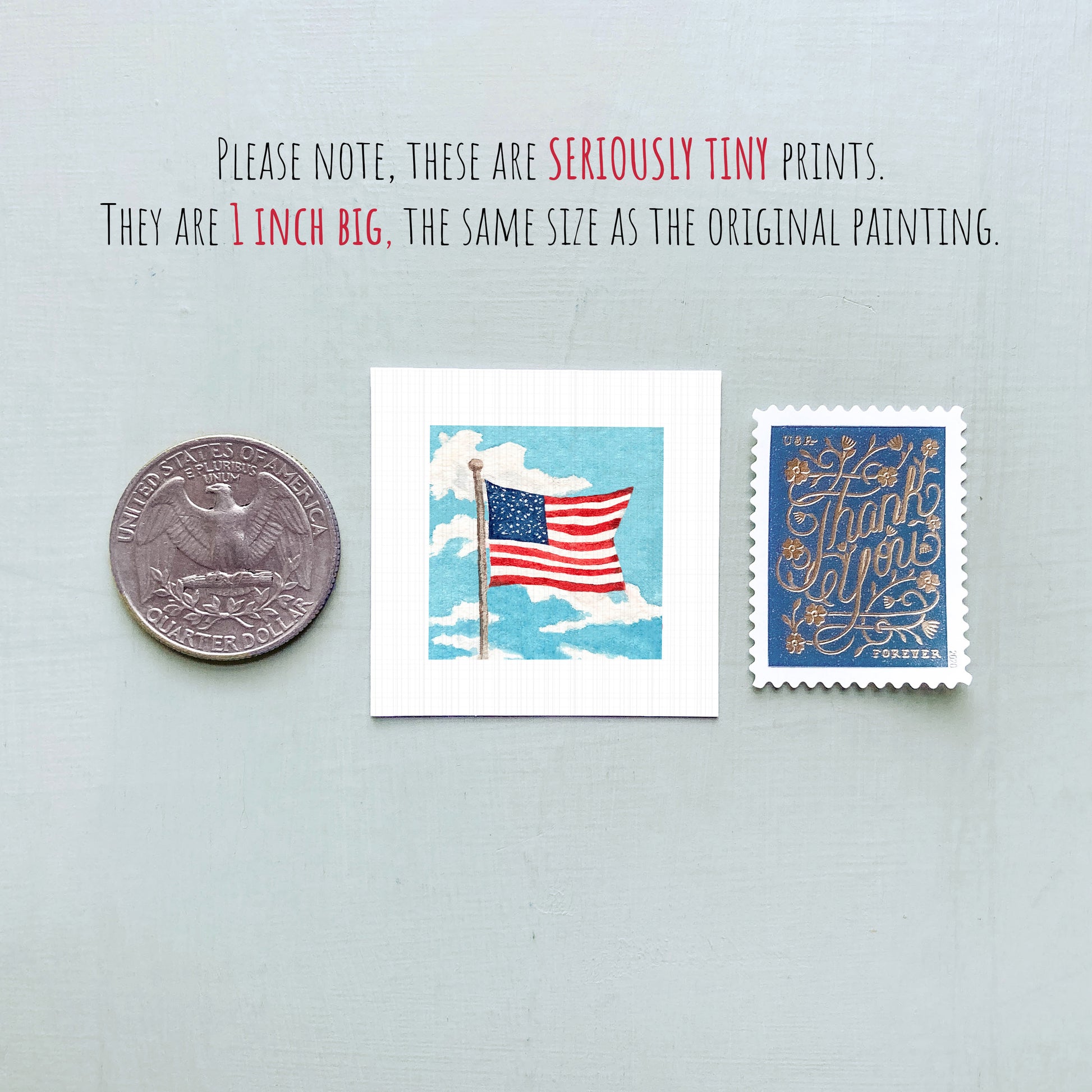 three small American flag-themed items: a quarter, a postage stamp, and a miniature painting of the American flag.