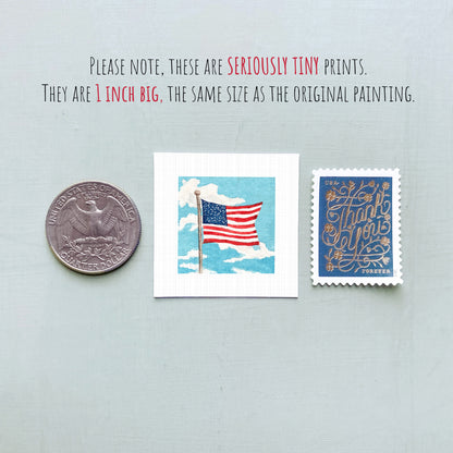 three small American flag-themed items: a quarter, a postage stamp, and a miniature painting of the American flag.