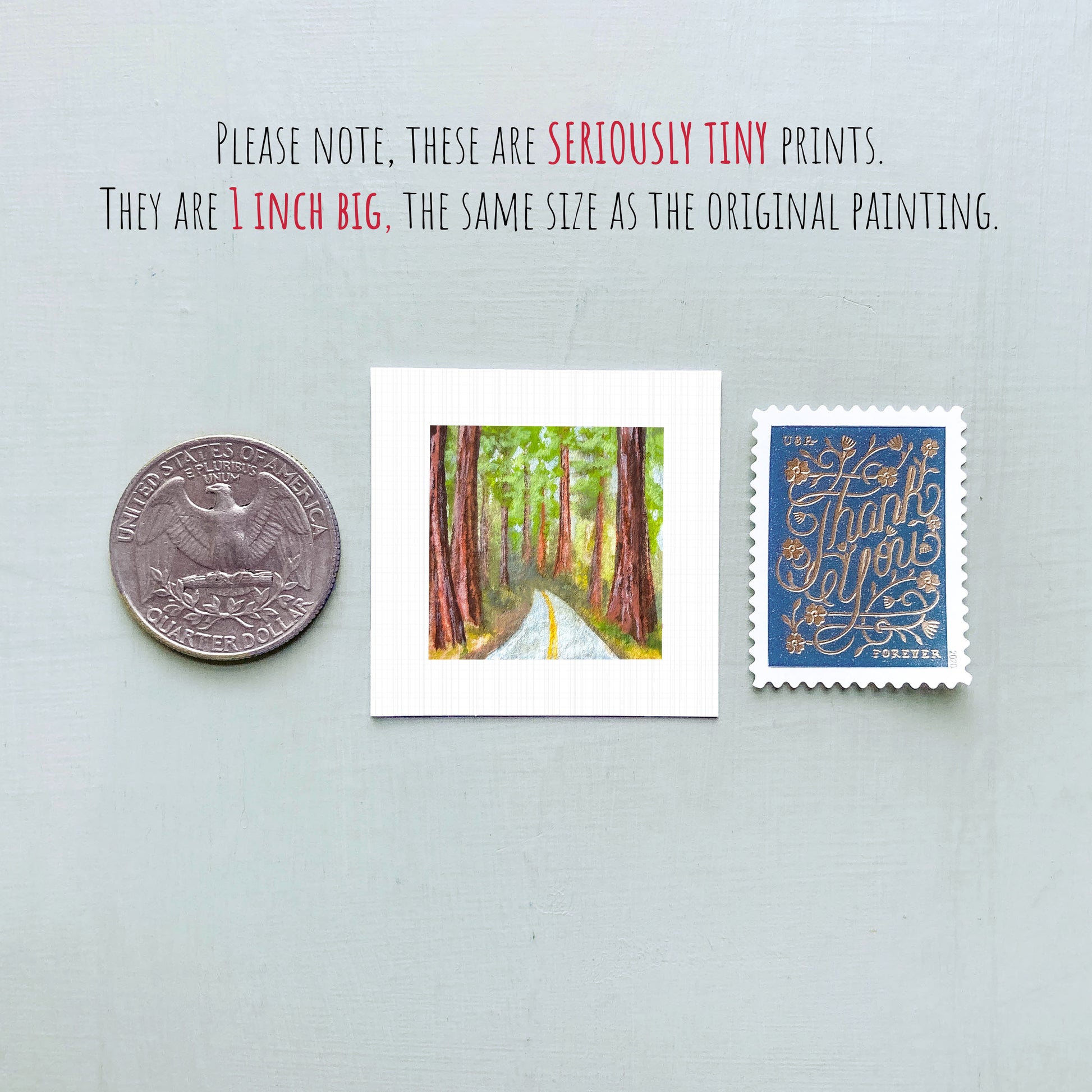 a collection of three small artworks or prints, including a coin, a painting of a forest, and a postage stamp, all of which are described as "seriously tiny prints" and "1 inch big" respectively.