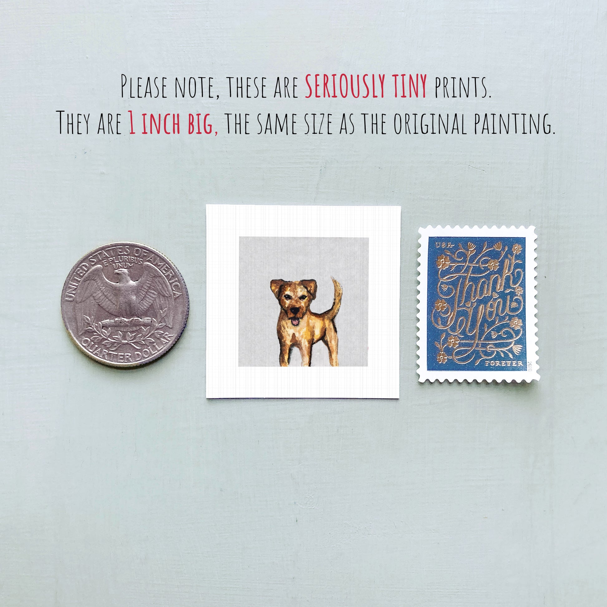 a small, 1-inch-big painting of a dog, a silver coin, and a blue postage stamp.
