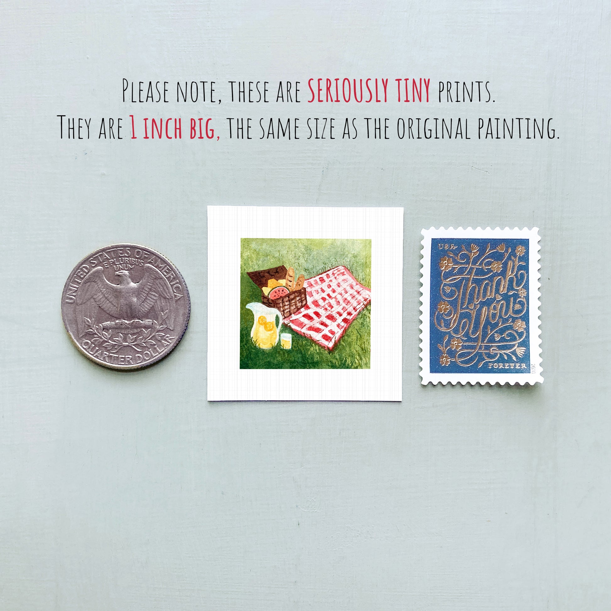 three small prints: a quarter, a square print of a picnic scene, and a postage stamp.