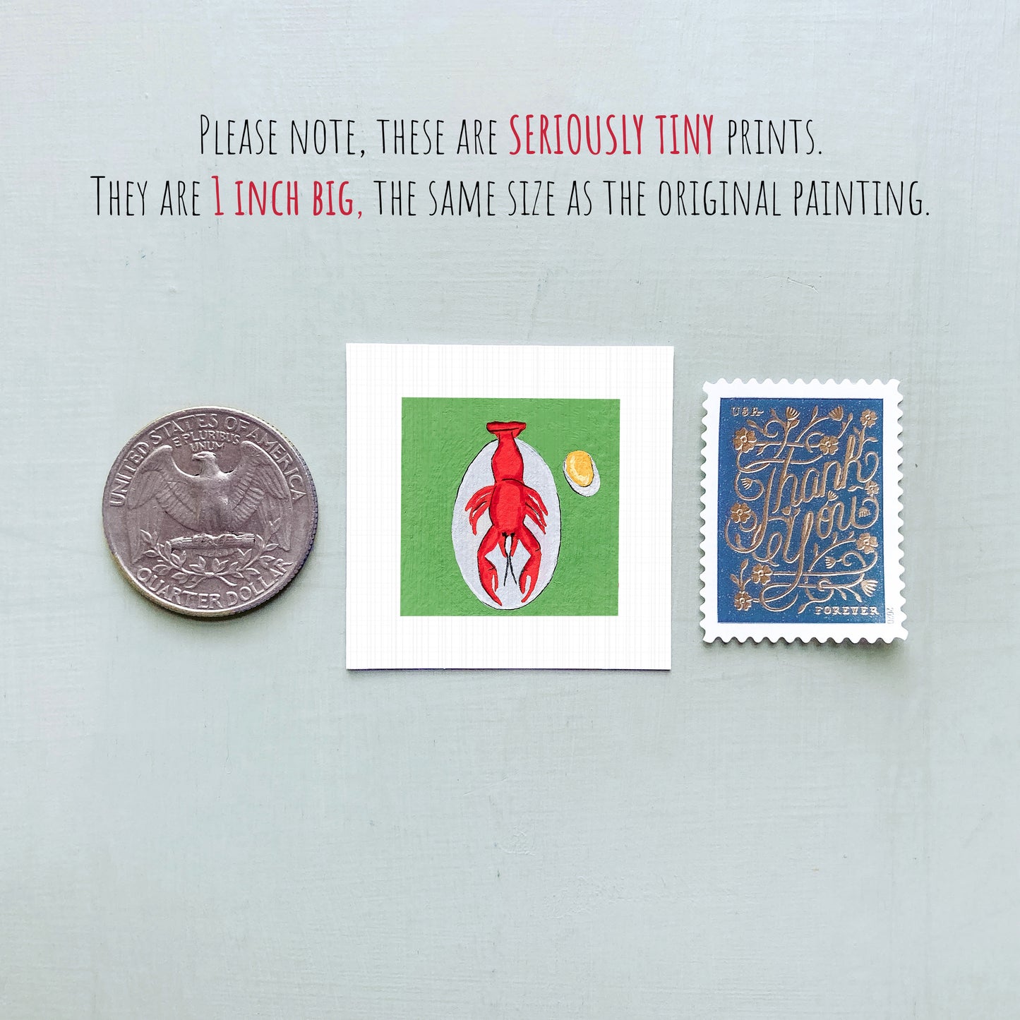 three small items: a quarter, a stamp, and a lobster drawing, all of which are described as "seriously tiny prints" and "1 inch big" in the provided text.