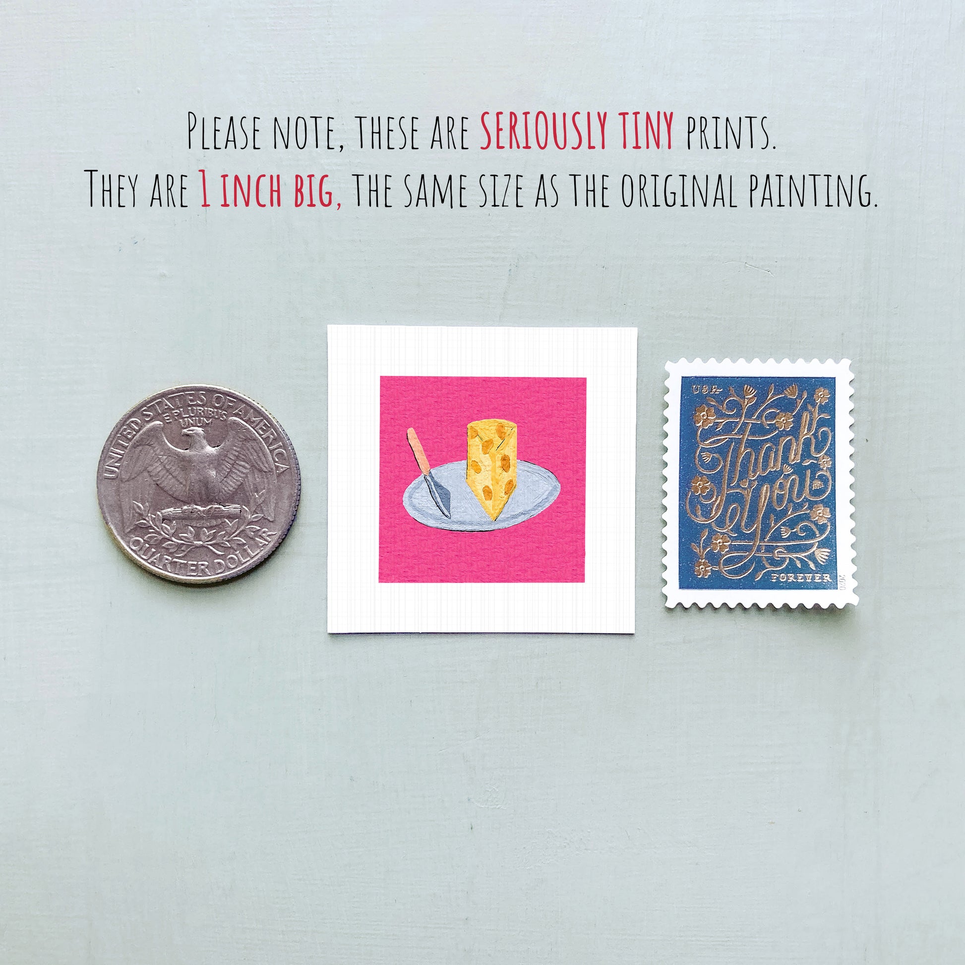three small items: a quarter, a piece of paper with a drawing of a slice of cheese on a plate, and a postage stamp.
