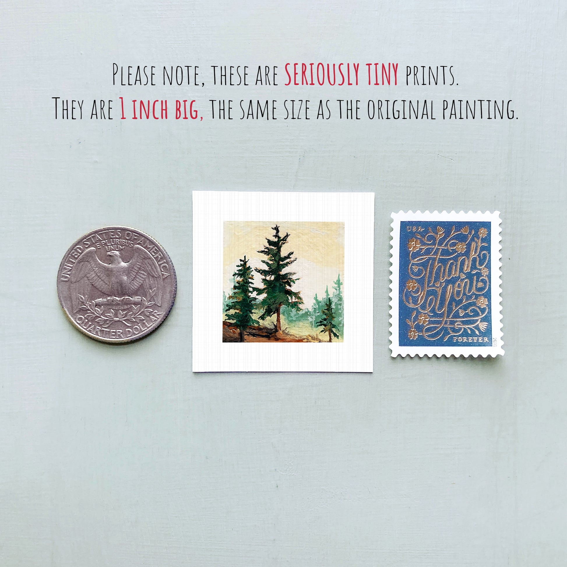three small prints and a coin, all of which are described as "seriously tiny prints" and "1 inch big," respectively.