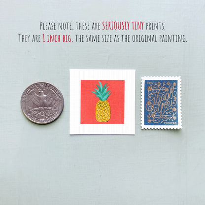 three small, seriously tiny prints: a United States quarter, a red square with a pineapple, and a blue postage stamp with gold lettering.