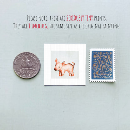 a pig illustration, a United States quarter, and a postage stamp, all of which are described as "seriously tiny prints" and "the same size as the original painting".