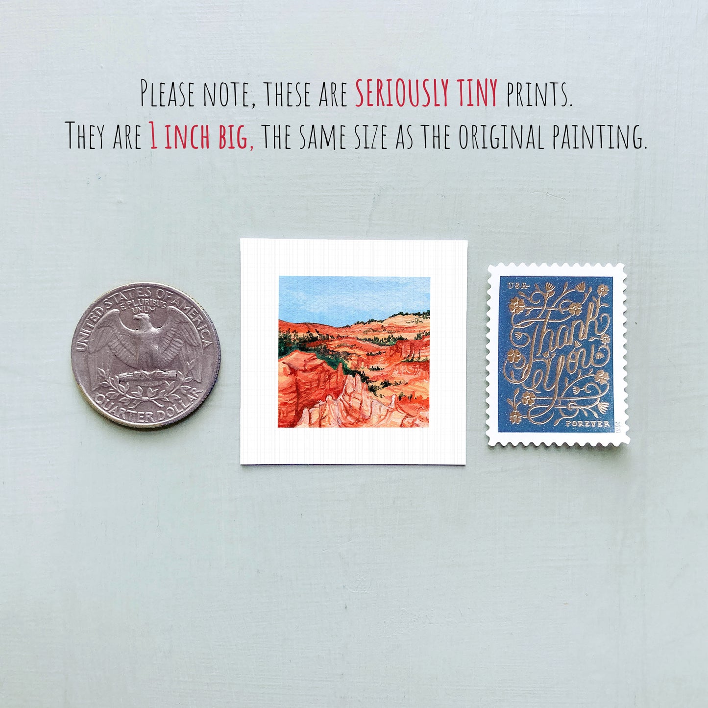 three small prints and a coin, all of which are described as "seriously tiny prints" and "1 inch big," respectively.