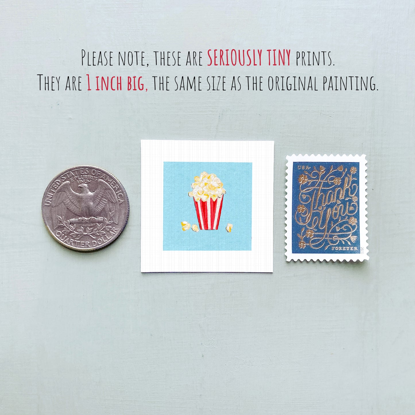 three small, seriously tiny prints: a United States quarter, a small illustration of popcorn, and a postage stamp.