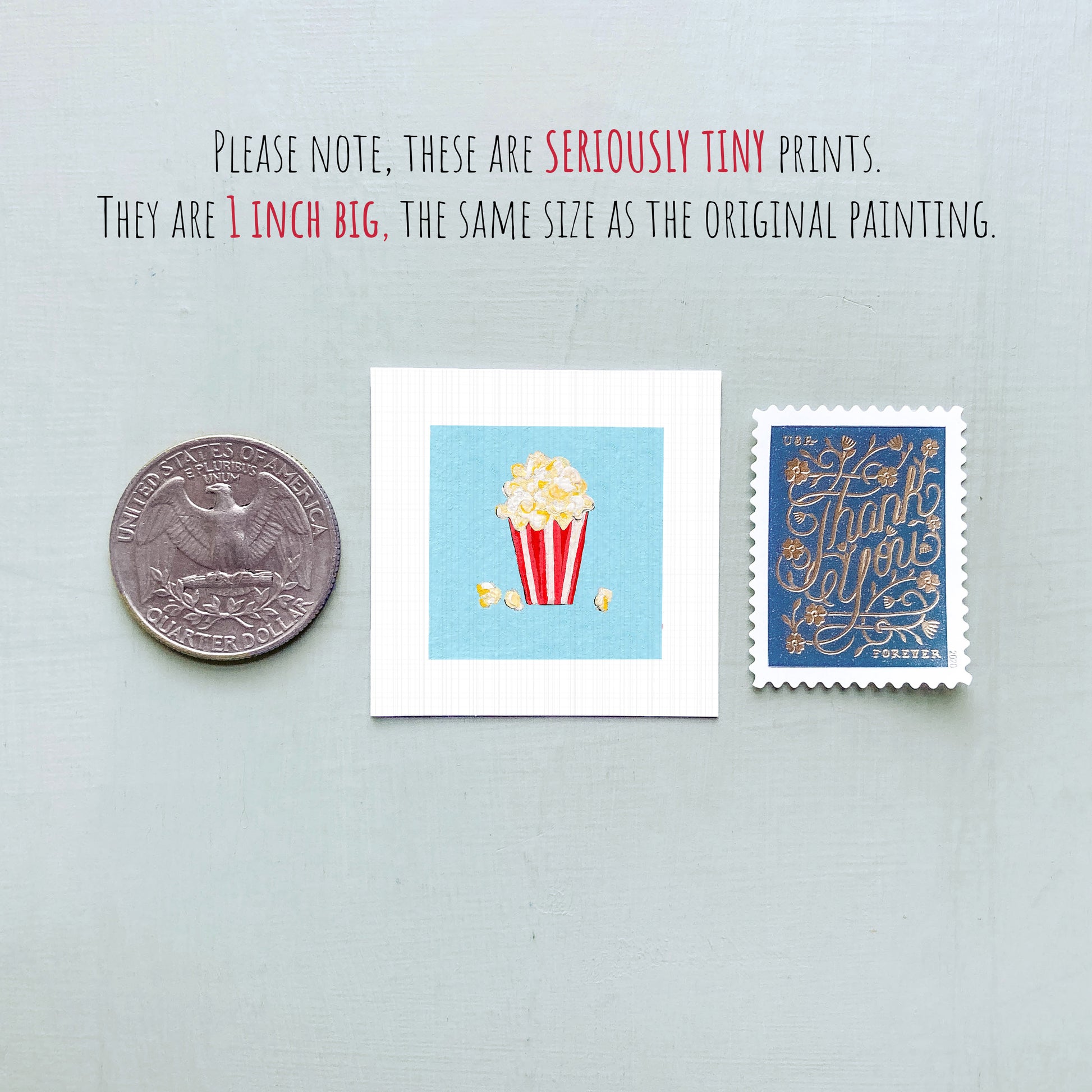 three small, seriously tiny prints: a United States quarter, a small illustration of popcorn, and a postage stamp.