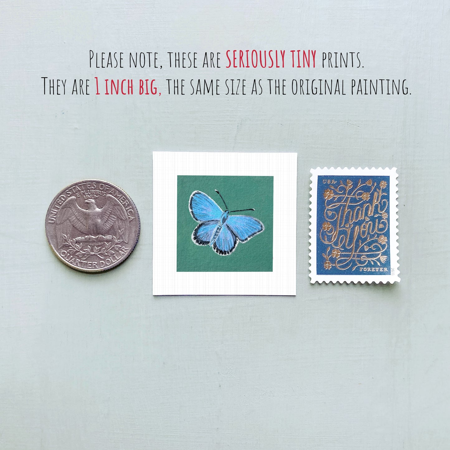 three small items: a quarter, a square print of a butterfly, and a postage stamp.