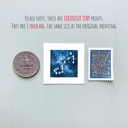 three small prints: a quarter, a square print with a blue background and white stars, and a postage stamp.