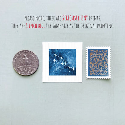 three small prints: a quarter, a square print with a blue background and white stars, and a postage stamp.