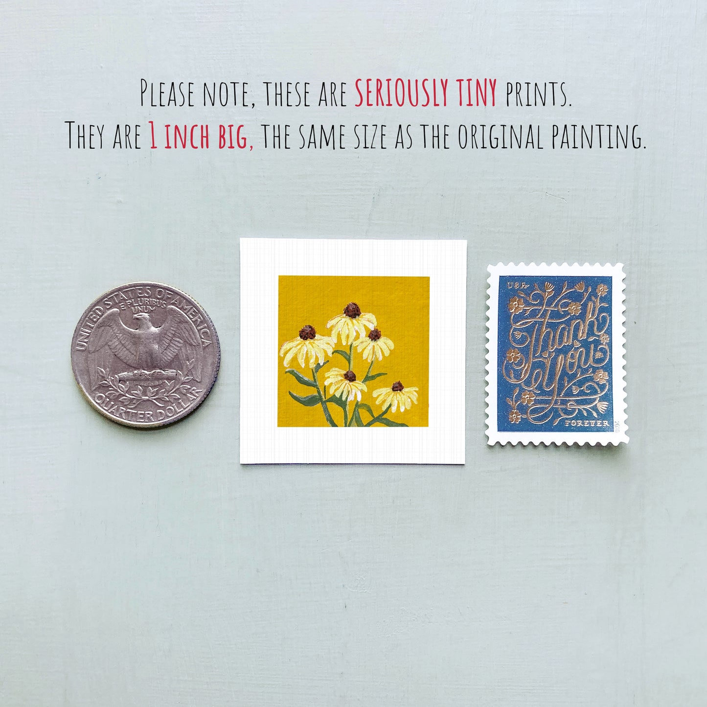 three small prints: a silver coin, a yellow square print with yellow flowers, and a blue postage stamp with gold lettering.