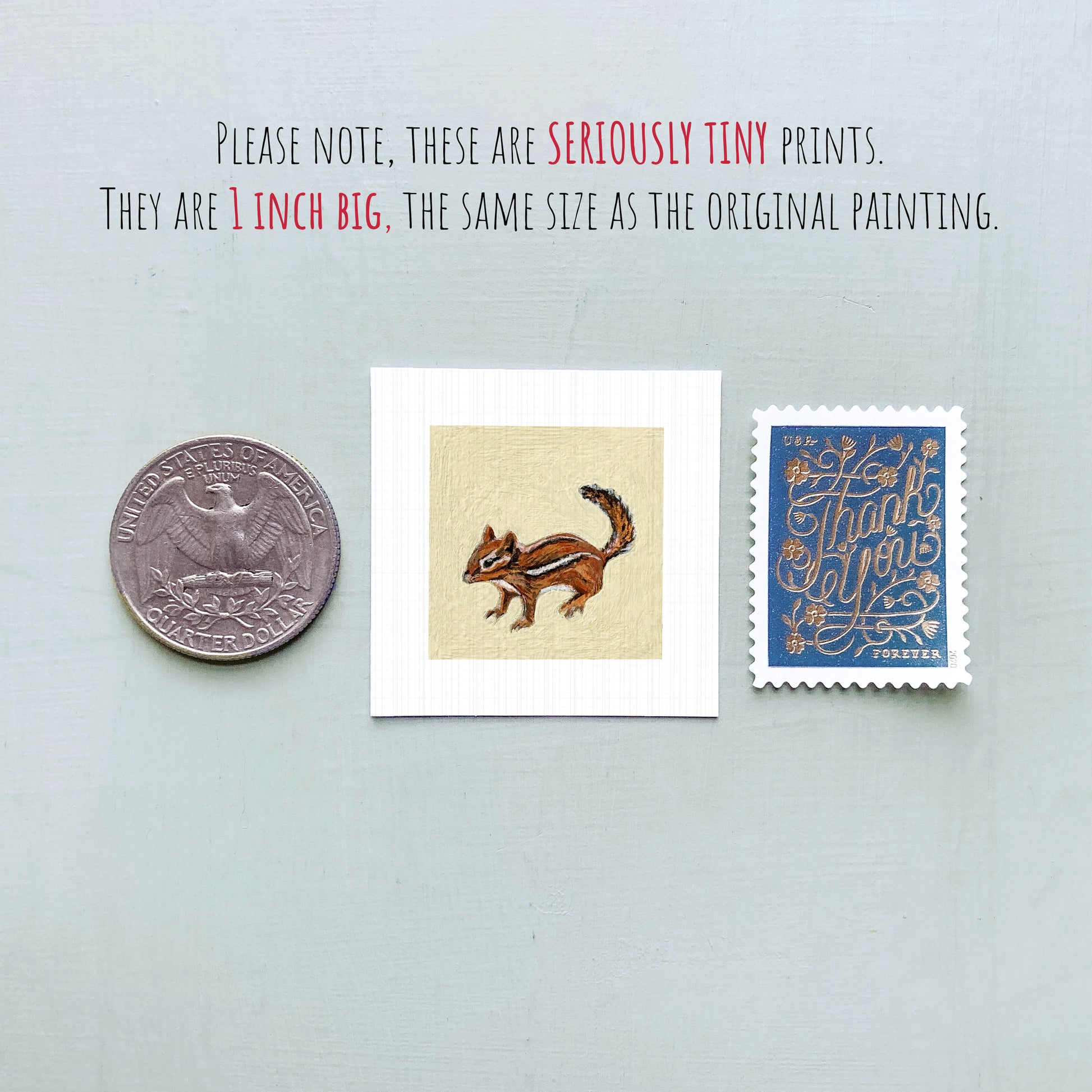 three small prints: a quarter, a square print of a squirrel, and a blue postage stamp with gold lettering.