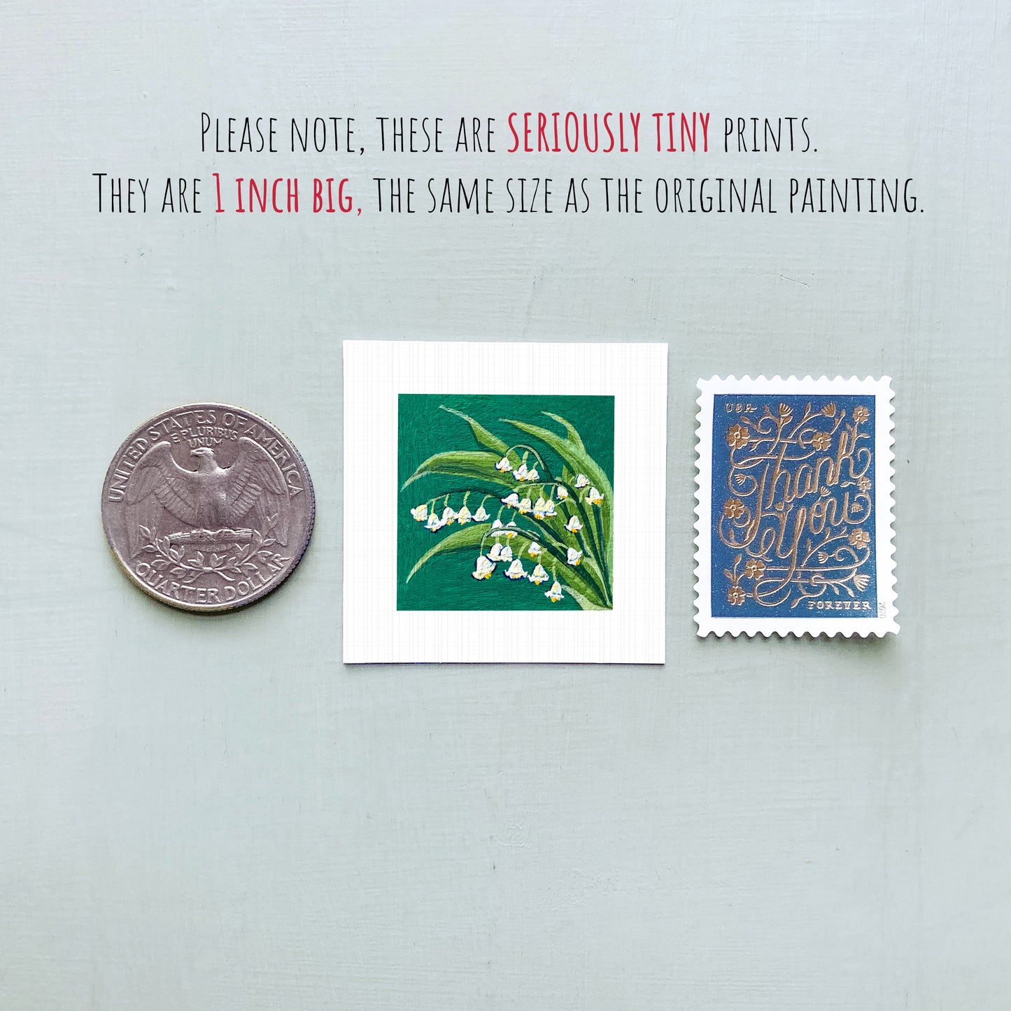 three small prints: a silver coin, a square print of a lily of the valley plant, and a blue postage stamp with gold lettering.