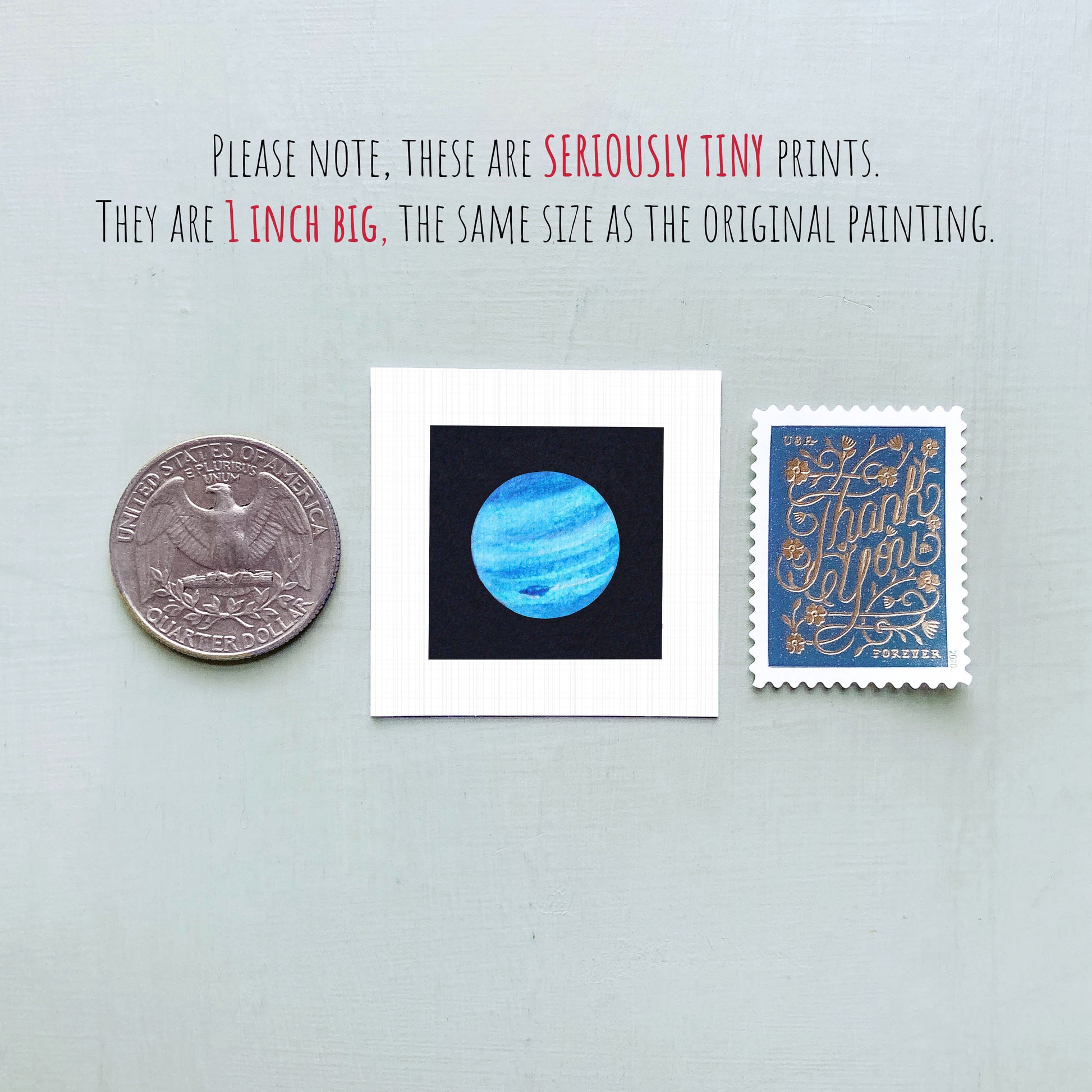 three small prints: a quarter, a square print of a blue planet, and a postage stamp.