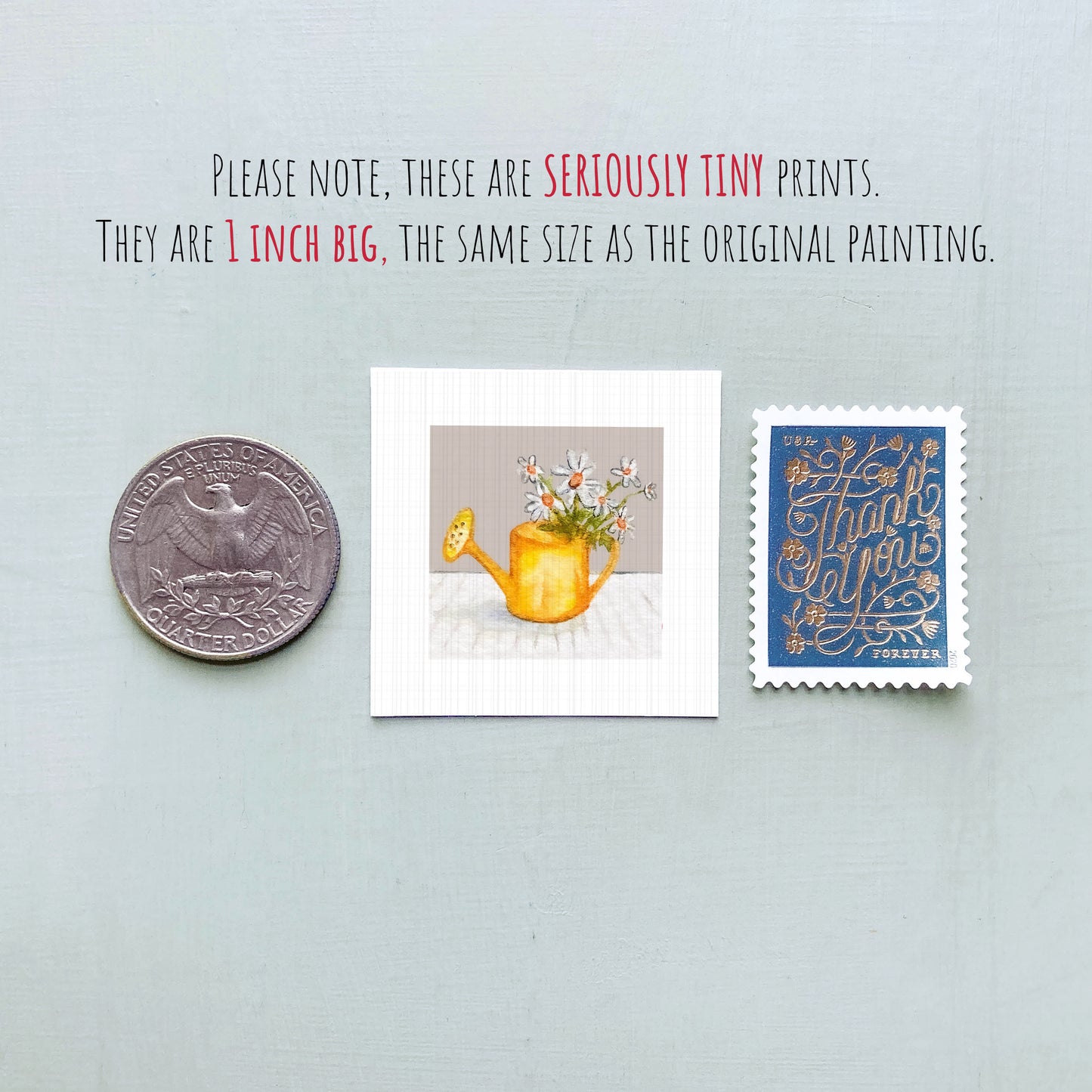 a collection of three small items: a quarter, a square print of a flowery vase, and a blue postage stamp.