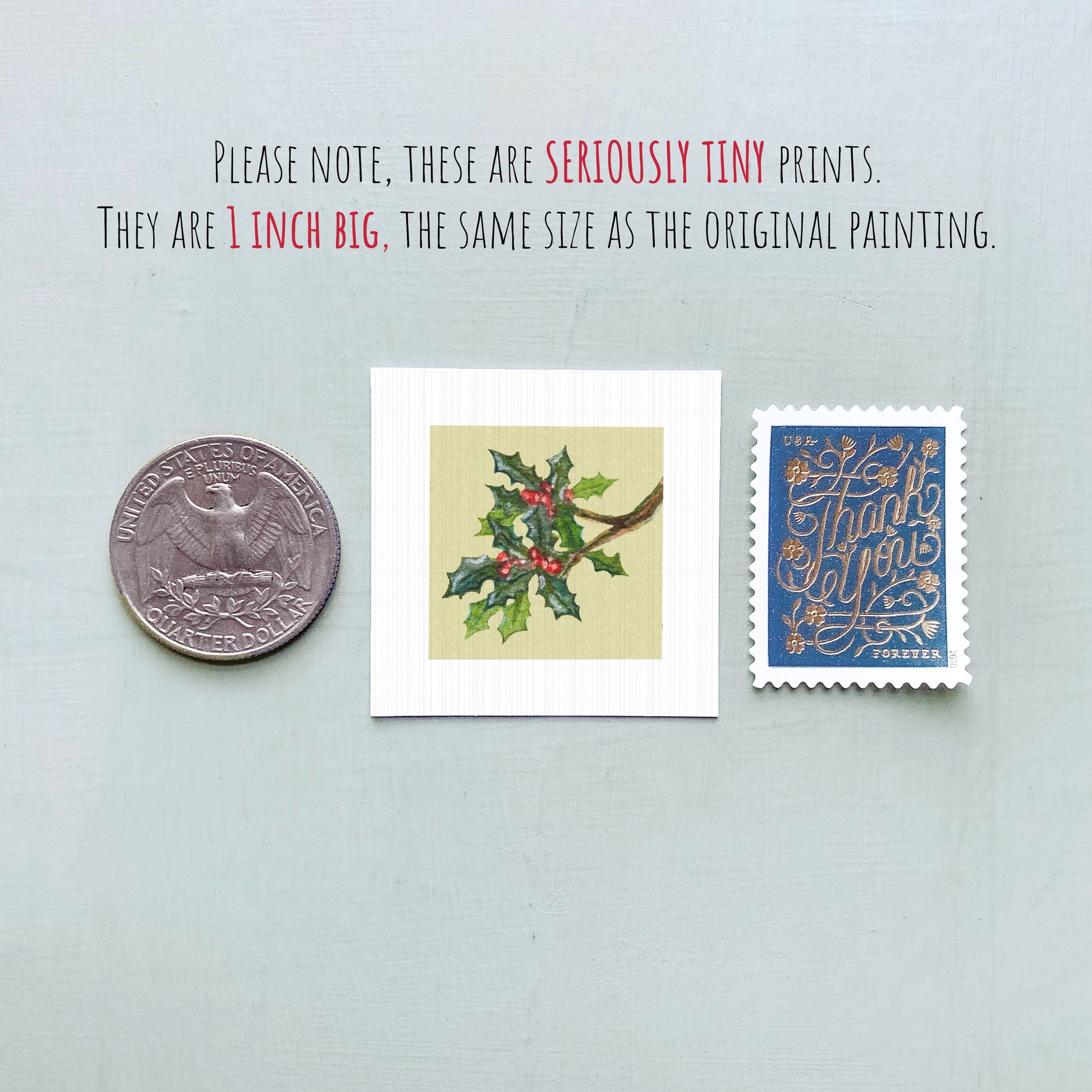 three small prints: a United States quarter, a square print of a holly leaf with berries, and a blue postage stamp with gold lettering.