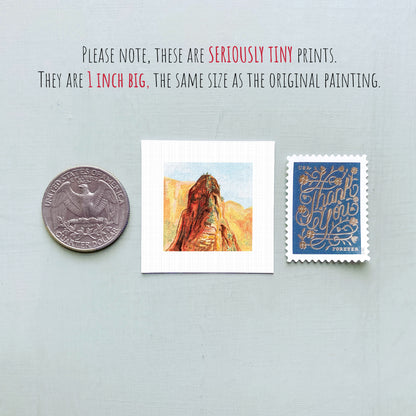 a collection of three small items: a quarter, a postage stamp, and a painting of a mountain.