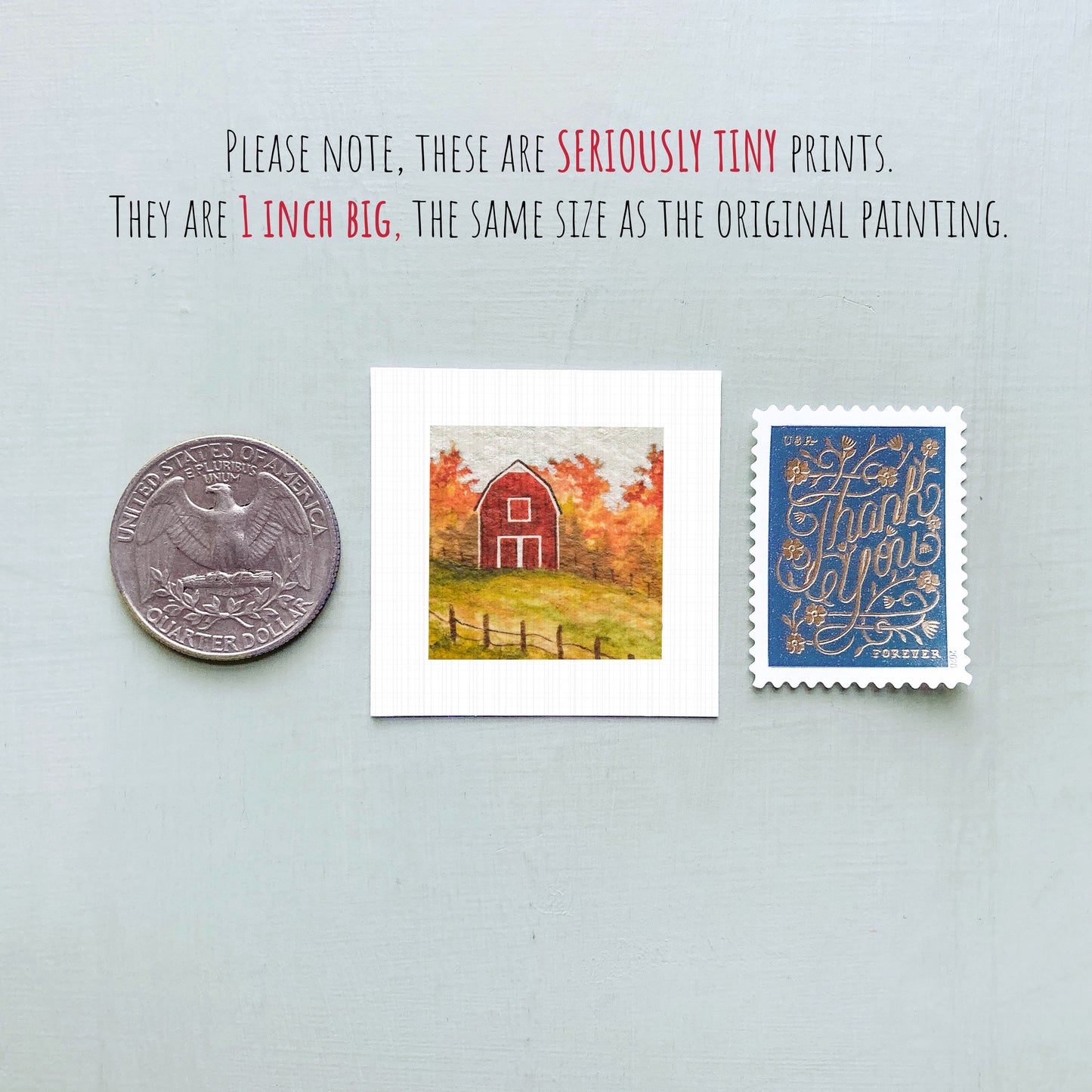 a collection of three small items: a quarter, a postage stamp, and a painting of a red barn.