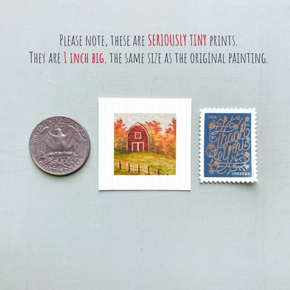 a collection of three small items: a quarter, a postage stamp, and a painting of a red barn.