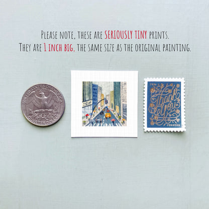 three small prints and a coin, all of which are described as "seriously tiny prints" and "1 inch big," respectively.