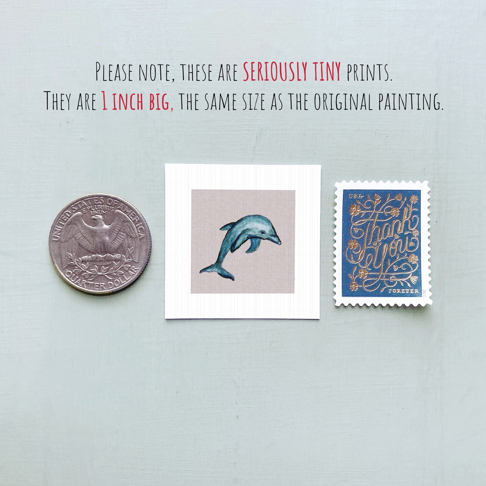 three small prints: a quarter, a dolphin print, and a postage stamp.