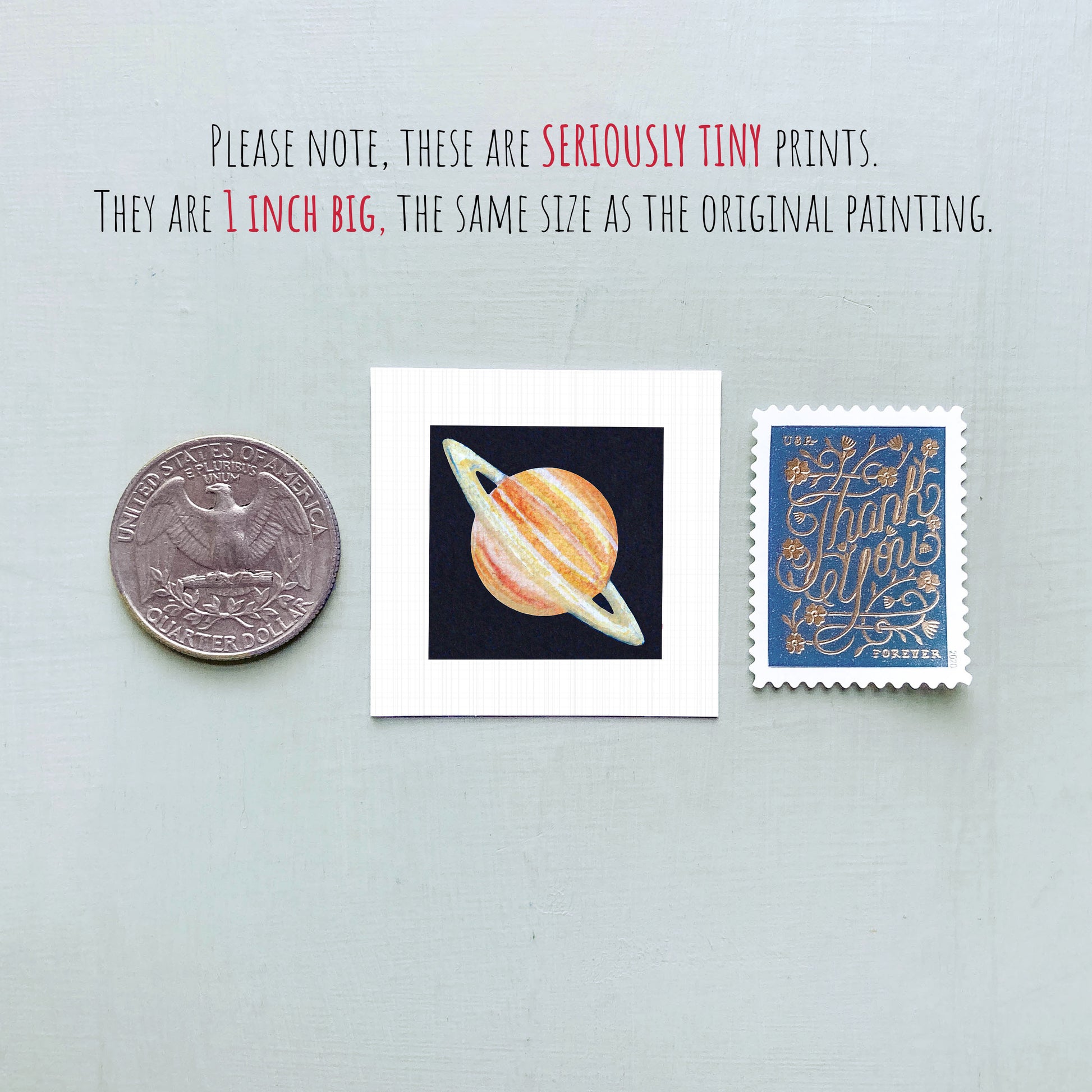 three small items: a quarter, a square print of a planet, and a postage stamp.