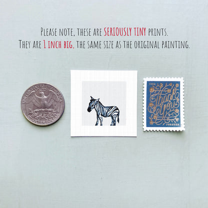 a collection of three small items: a quarter, a zebra illustration, and a postage stamp.