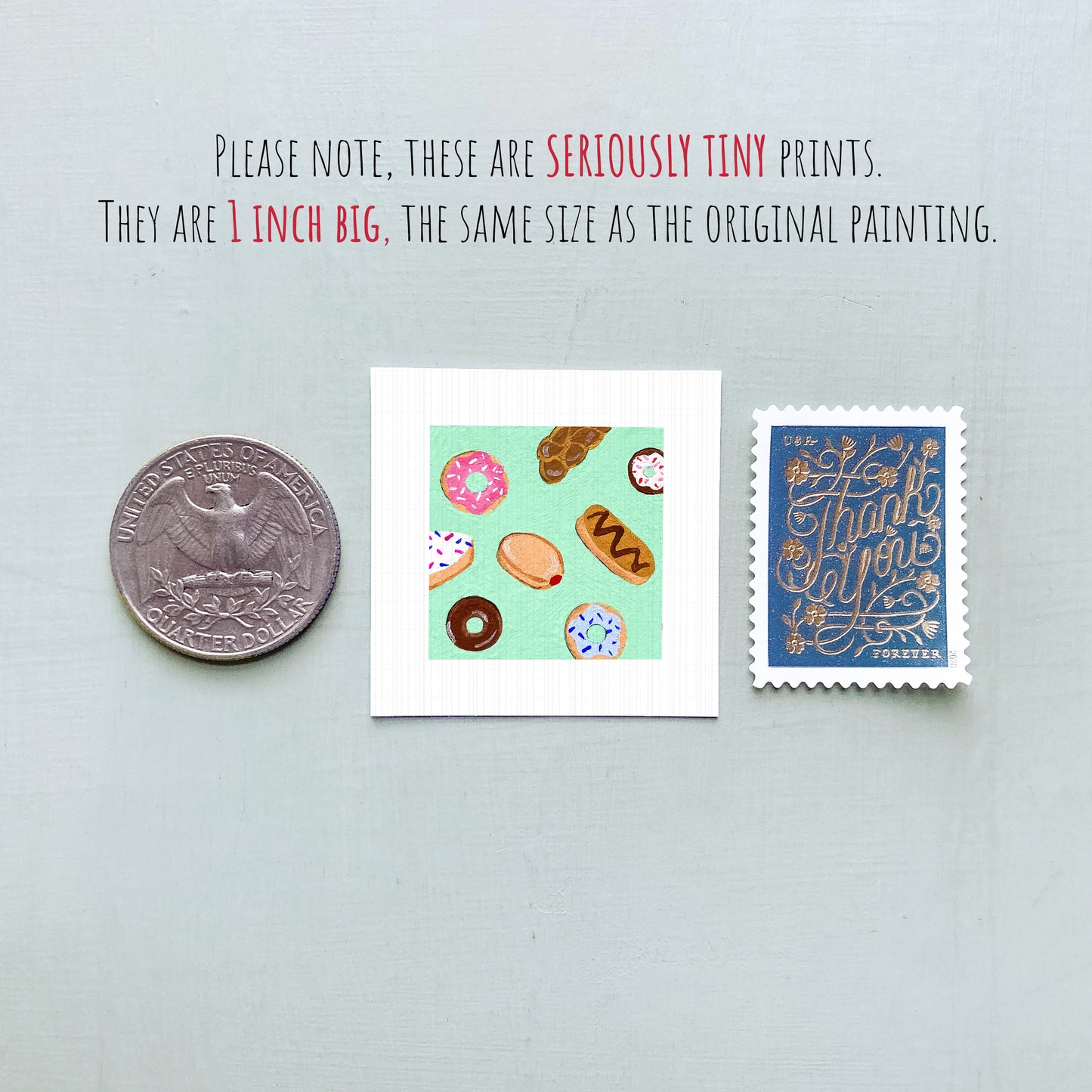 three small prints: a silver coin, a square print with colorful donuts, and a blue postage stamp with gold lettering.