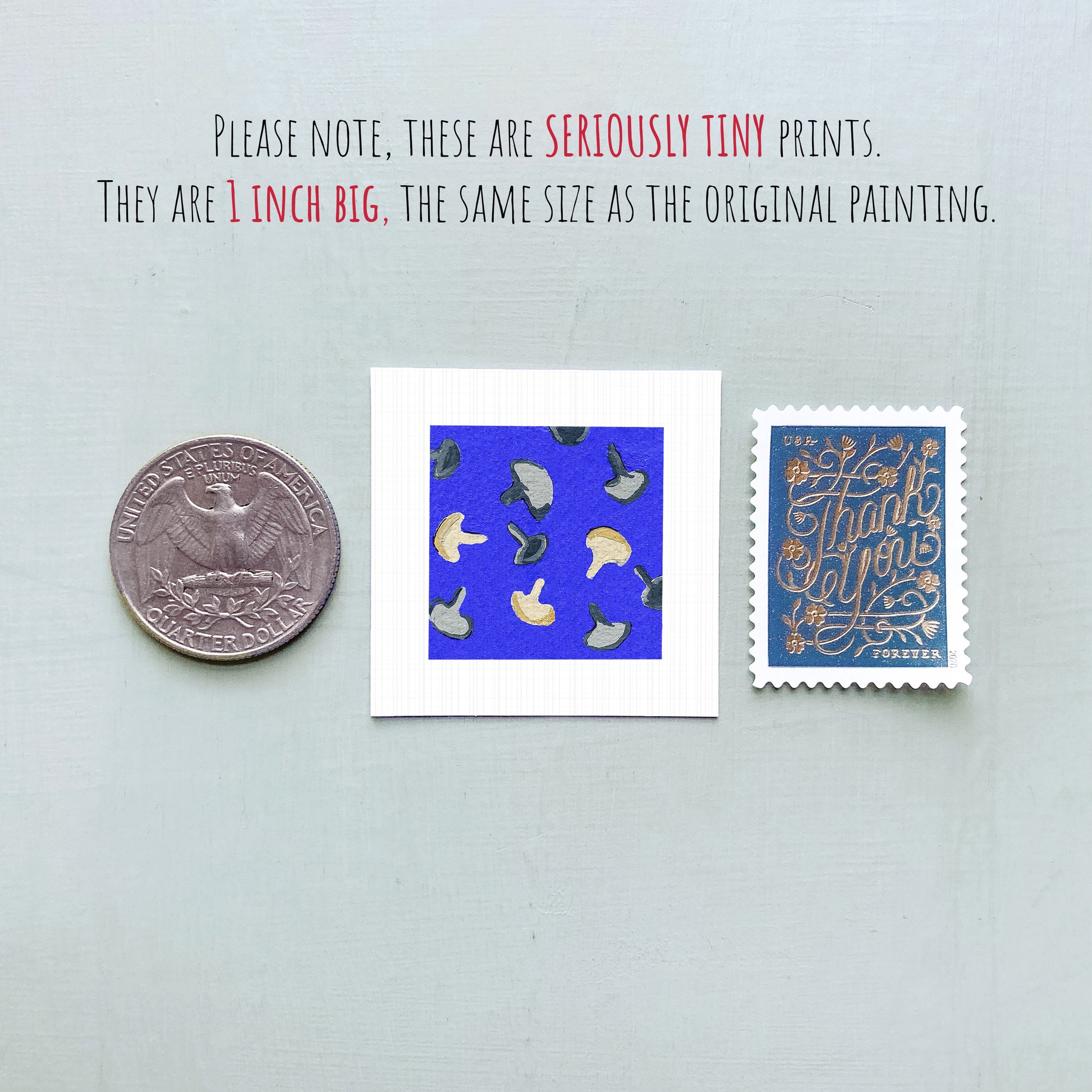 three small artworks: a silver coin, a square with a blue background featuring a pattern of mushrooms, and a blue postage stamp with gold lettering.