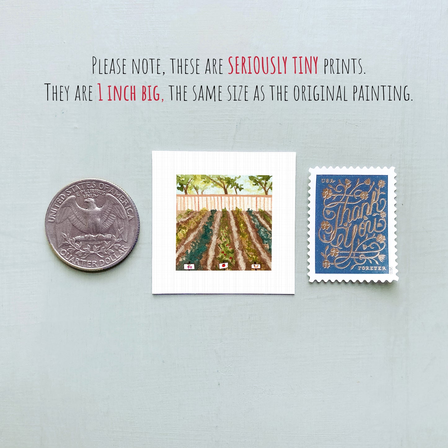 three small prints: a United States quarter, a square print of a garden scene, and a blue postage stamp with gold lettering.