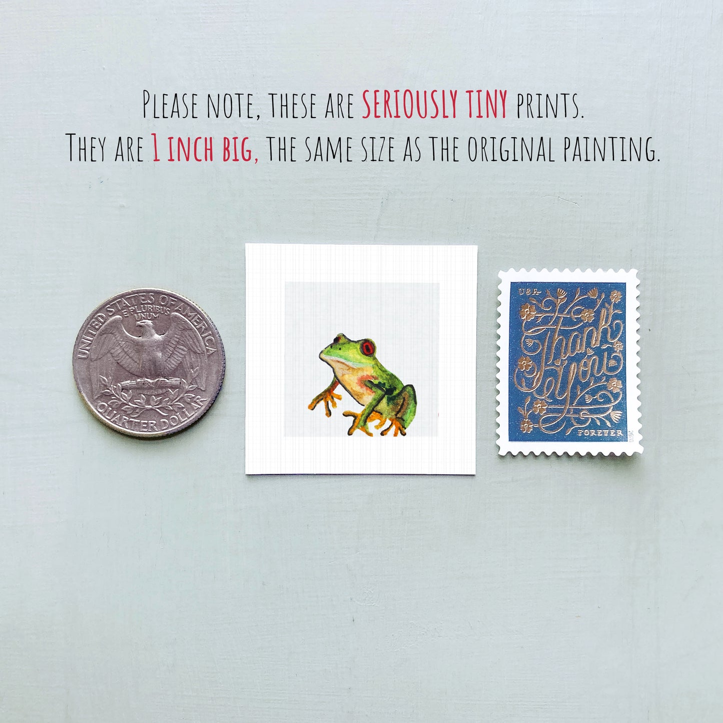 three small, tiny prints: a quarter, a frog print, and a postage stamp.