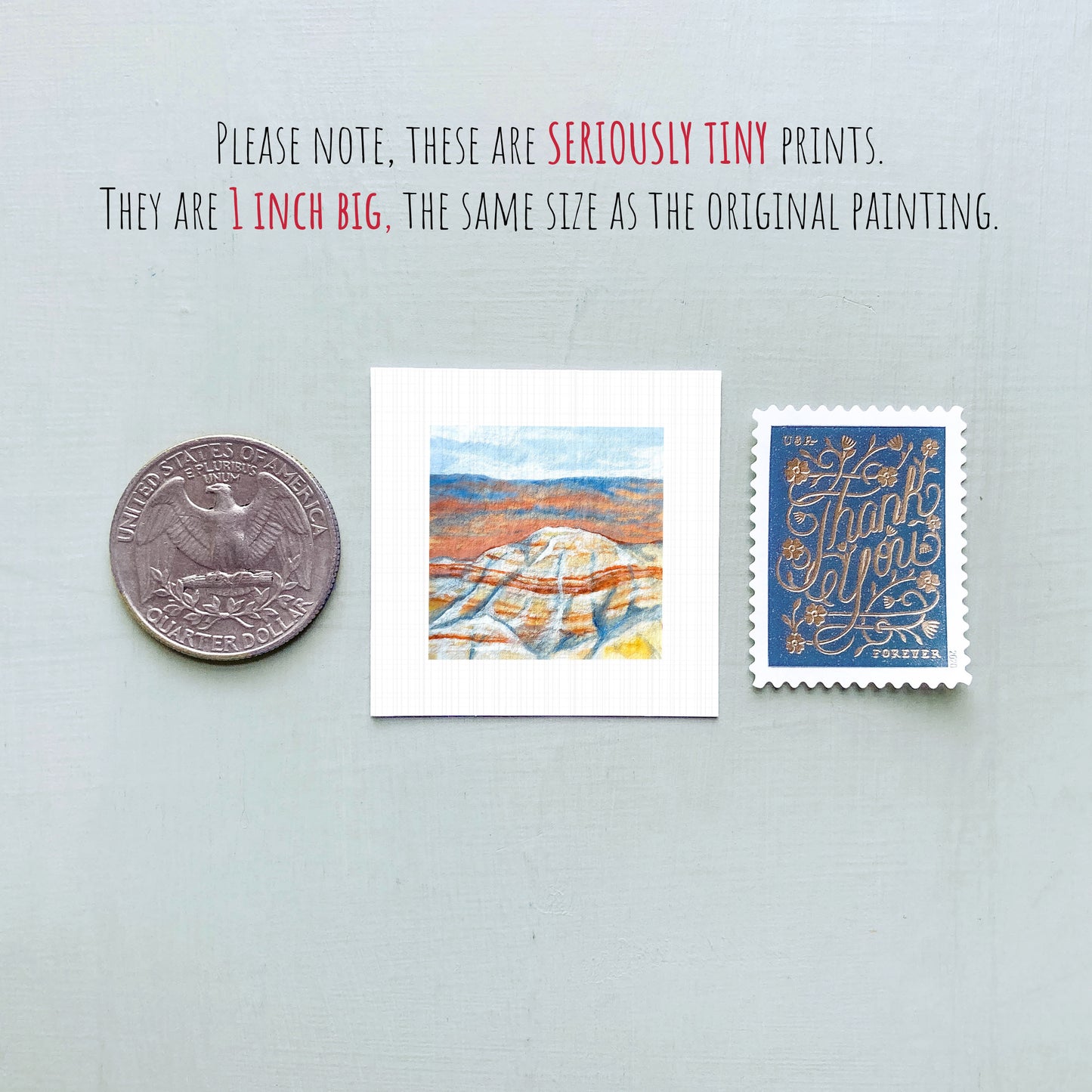 three small prints: a quarter, a postage stamp, and a painting.