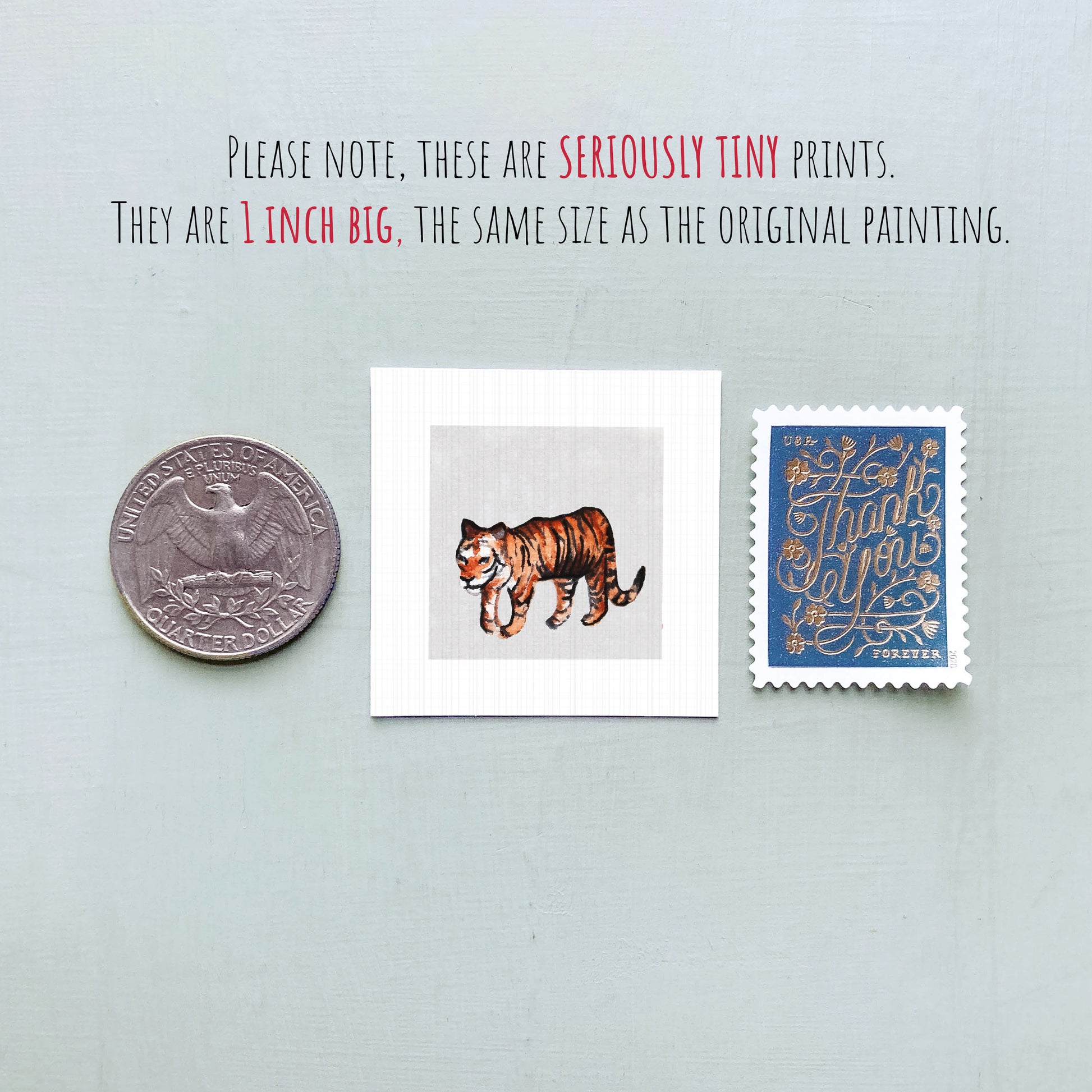 three small prints: a quarter, a tiger print, and a postage stamp.