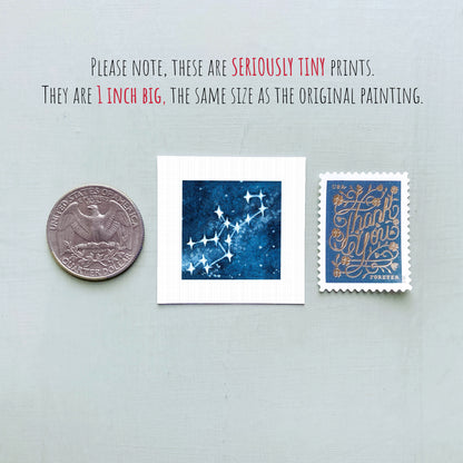 three small prints: a quarter, a square print with a starry night sky, and a postage stamp.