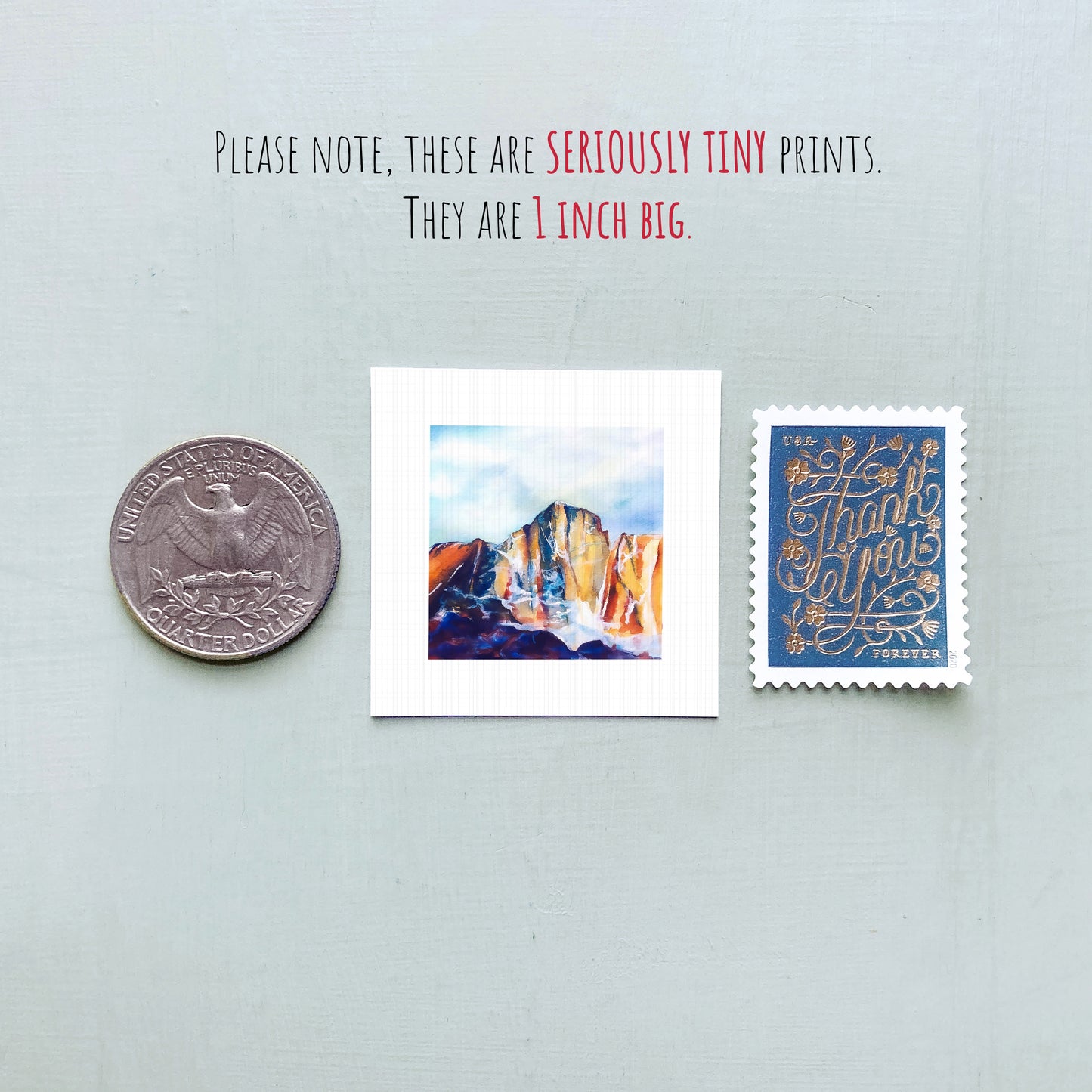 a collection of three small prints, including a quarter, a postage stamp, and a postcard, all of which are described as "seriously tiny prints" and "1 inch big."